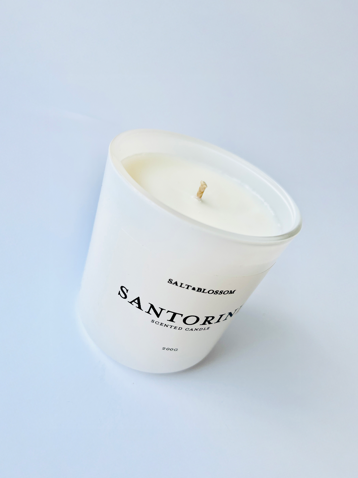 Santorini candle in white jar