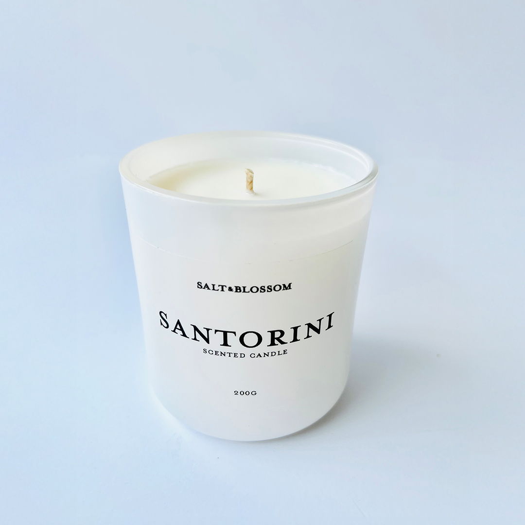 Santorini candle in white jar