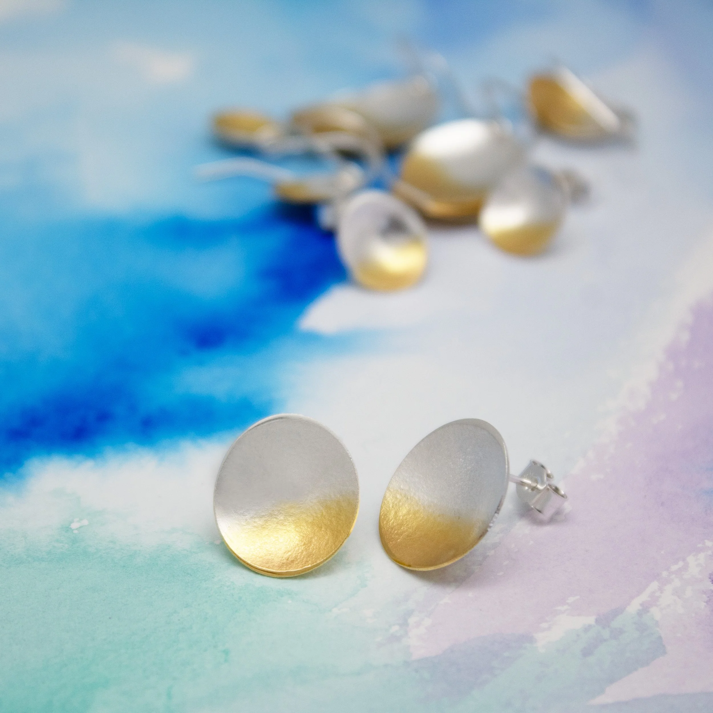 IELS with earrings in background.jpg