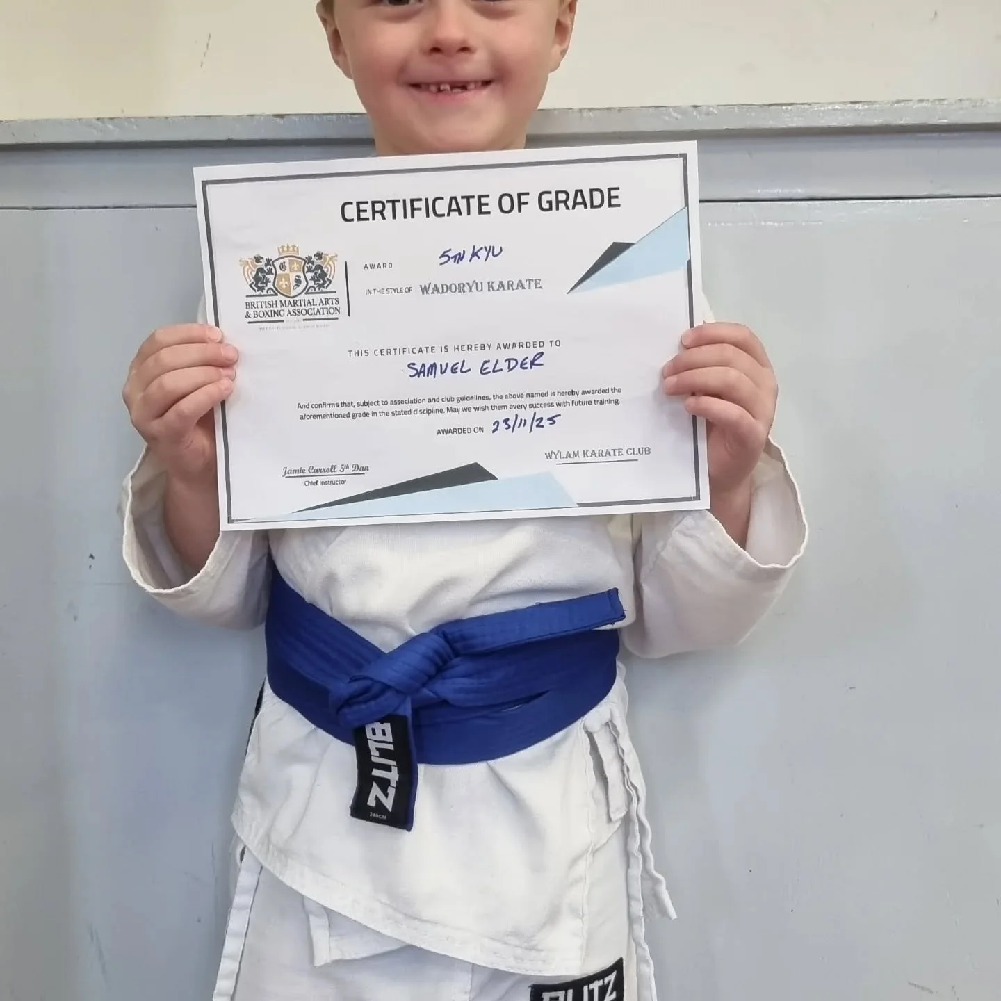 Sam is now a blue belt at karate. Dont mess with this little ninja