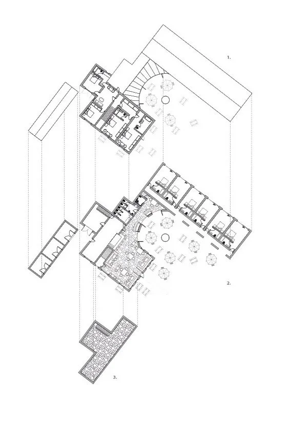 Architectural floor plan for a building with multiple rooms, hallways, and outdoor patio areas with tables and umbrellas.