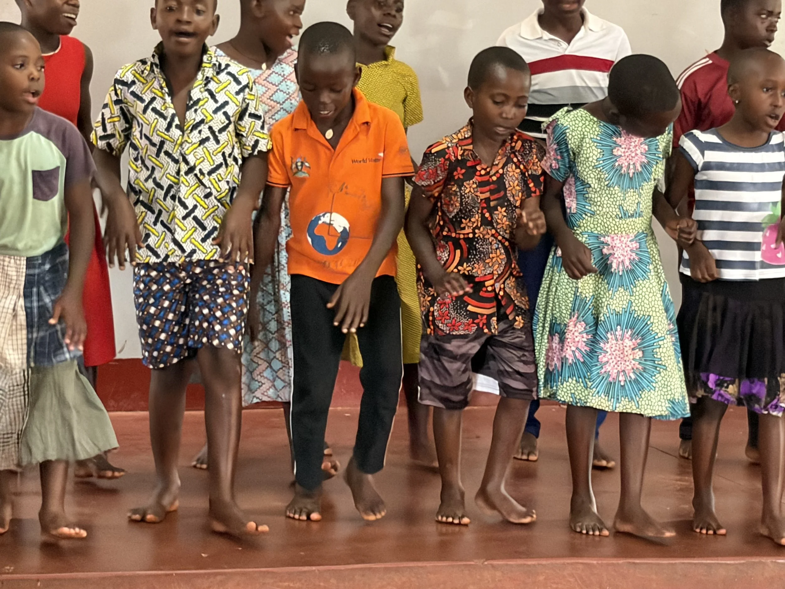 Children at our Home doing a celebratory dance