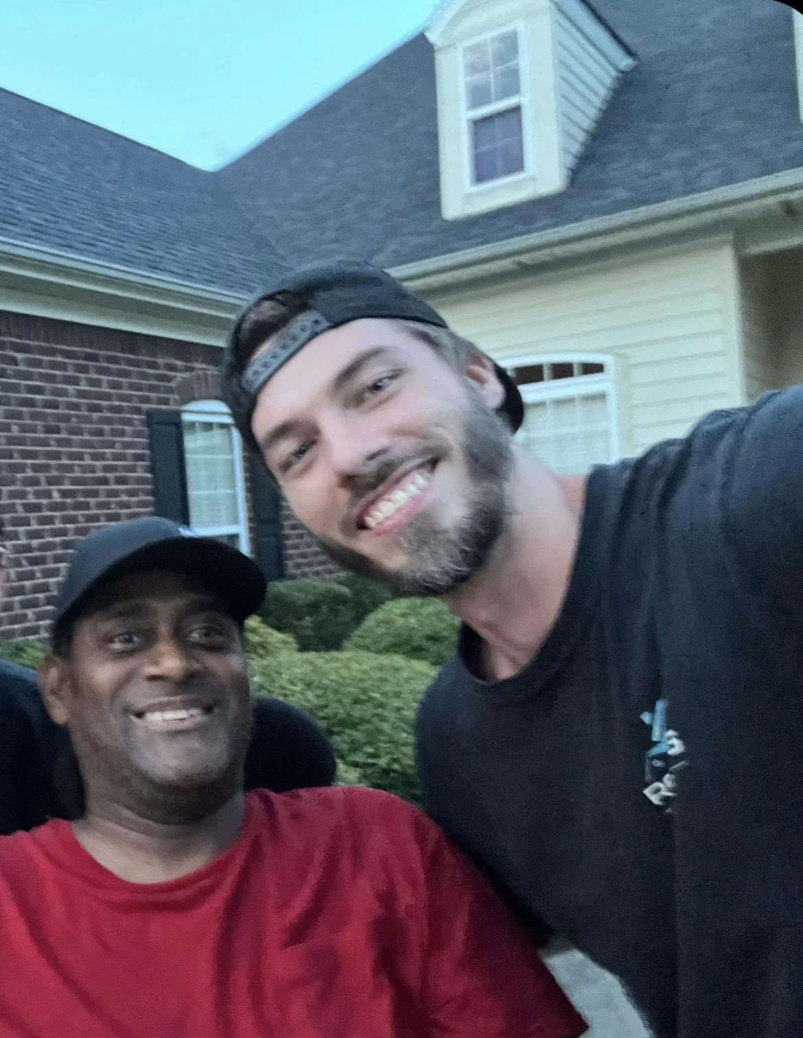 Georgia Roofing Rescue owner Hunter Barnett with the homeowner after completing his Hurricane Helene roof replacement.