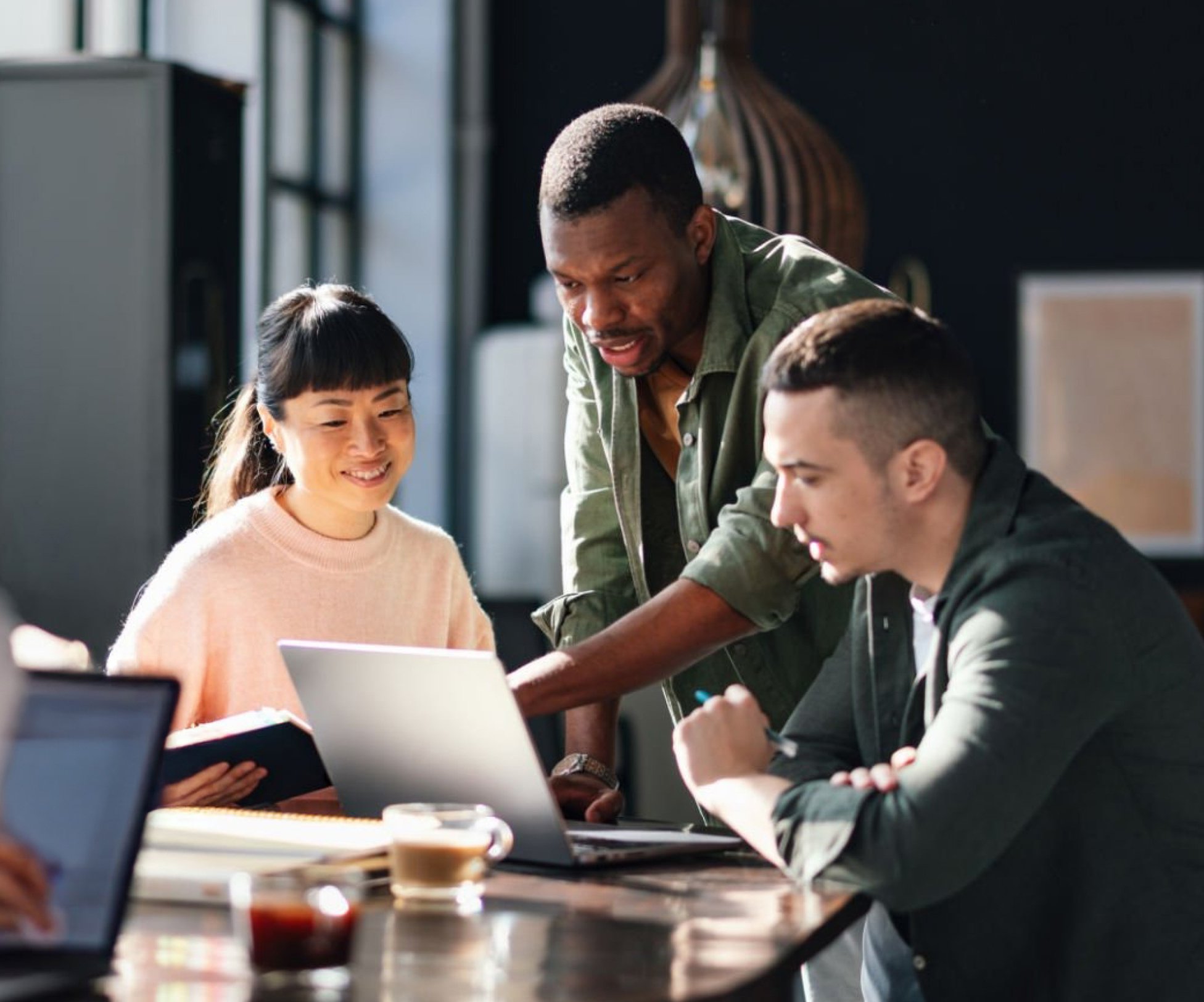 3 people working at the office