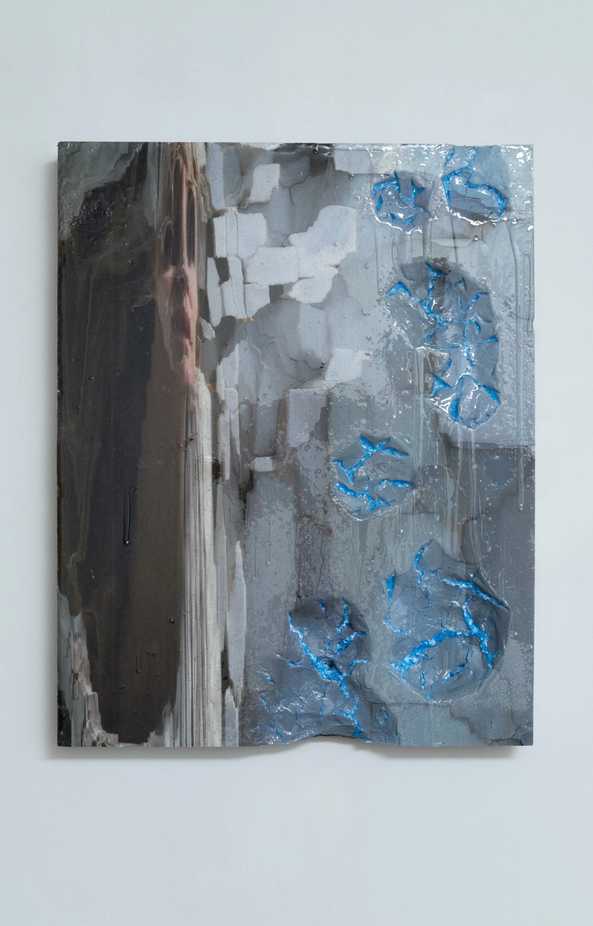 Jānis Dzirnieks, One of The Best Memory Apps in the World, 2026, UV inkjet print on found EPS foam, epoxy resin,steel, 50 x 63cm. 
