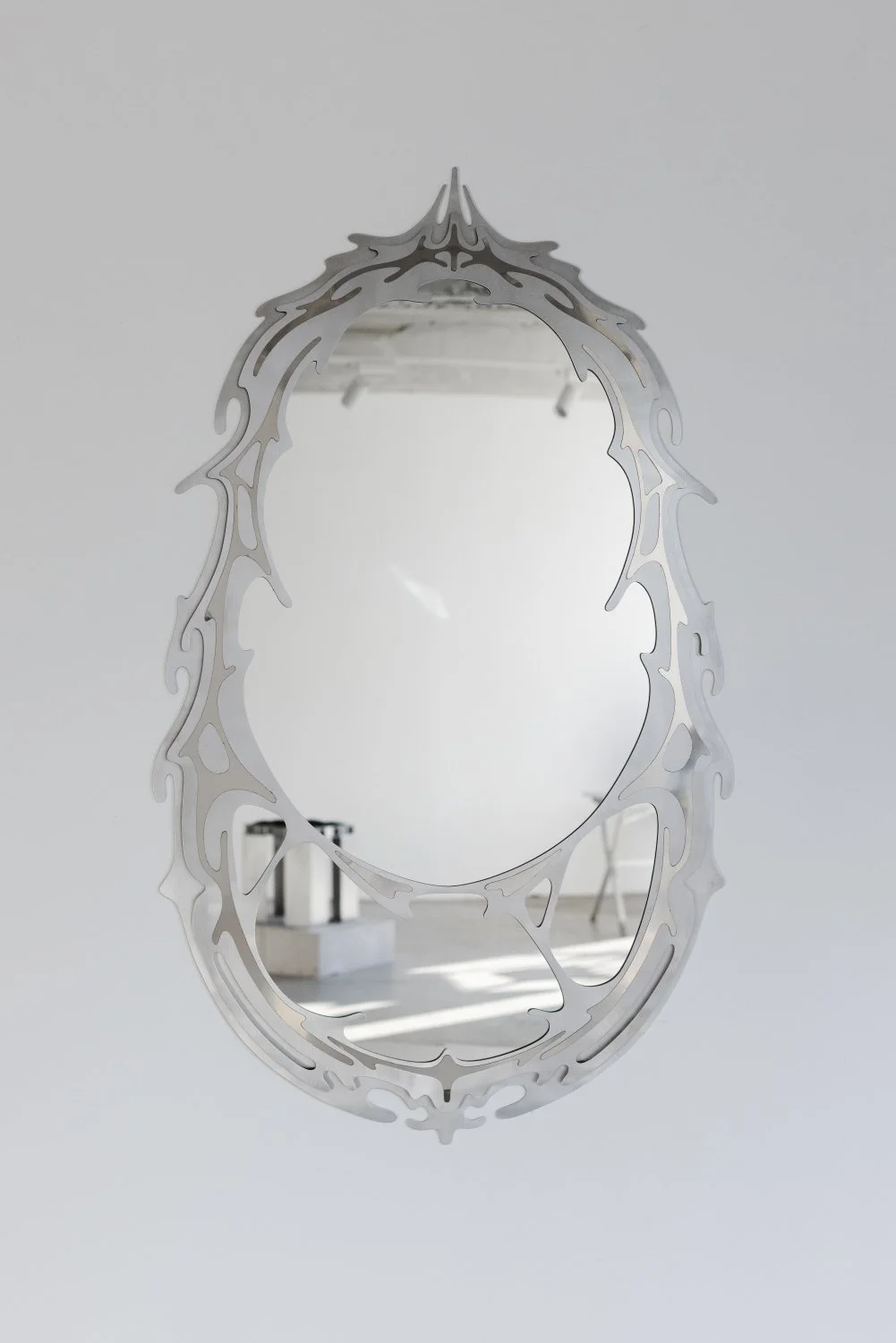 Aleksandrs Breže, Mirror from series Threshold, 2026, Aluminum, stainless steel, glass, 128 x 73 cm. Photo: Kristīne Madjare
