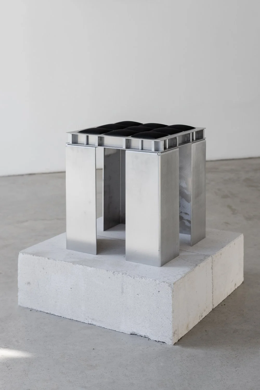 Aleksandrs Breže, Chair  from series Threshold, 2026, Aluminum, vegan leather, 44 x 38 x 38 cm. Photo: Kristīne Madjare