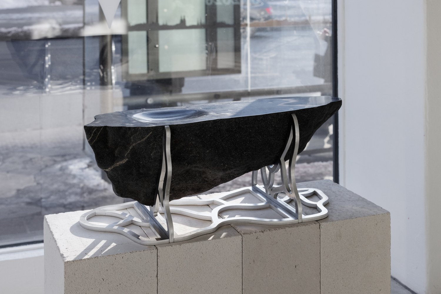 Aleksandrs Breže, Wooden table, 2026, Stone, aluminum, 27 x 27 x 63 cm. Photo: Kristīne Madjare