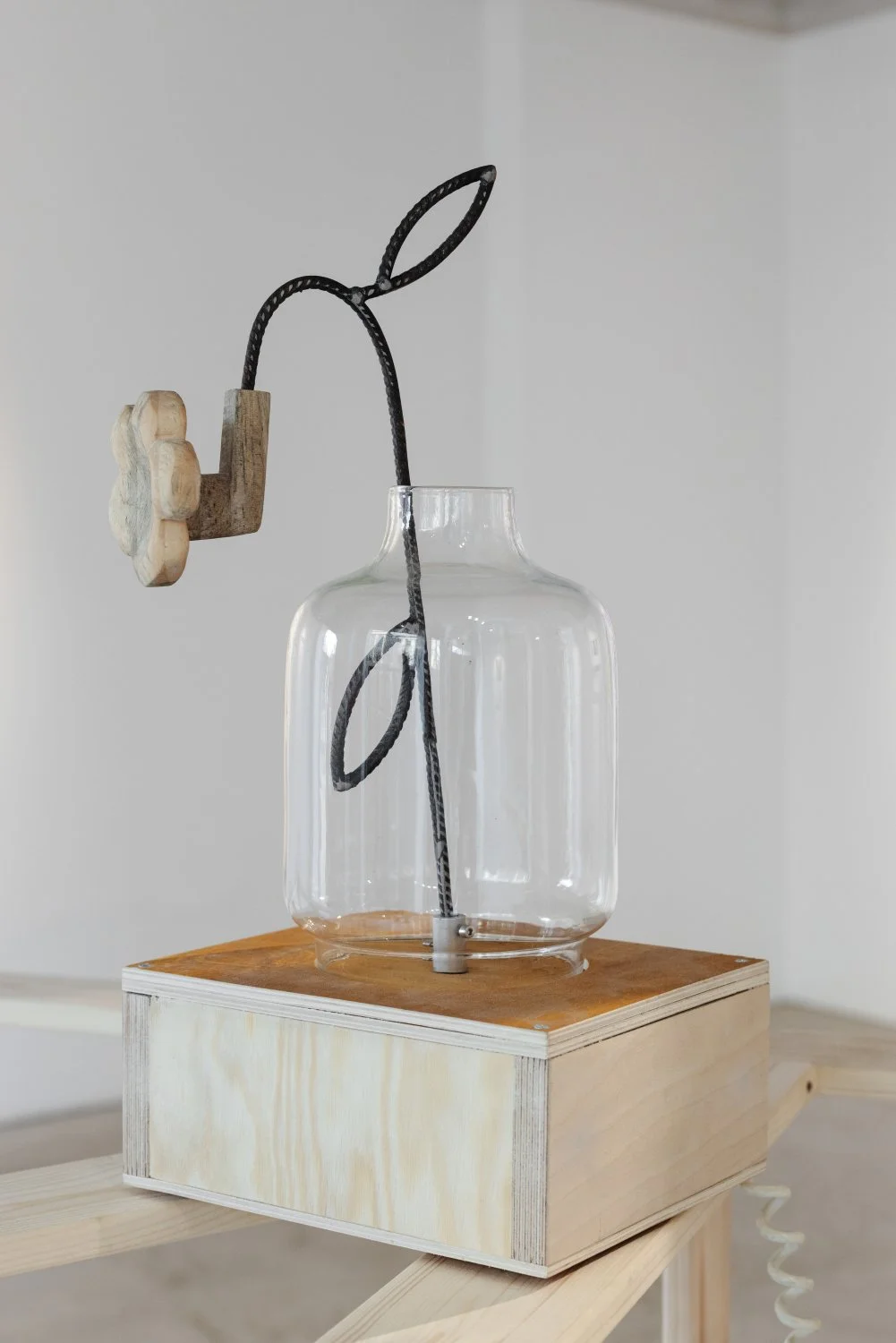 Miķelis Mūrnieks, Routine, 2026, Wood, glass, steel, varnish, motor, 25 x 25 x 50cm. Photo: Kristīne Madjare.