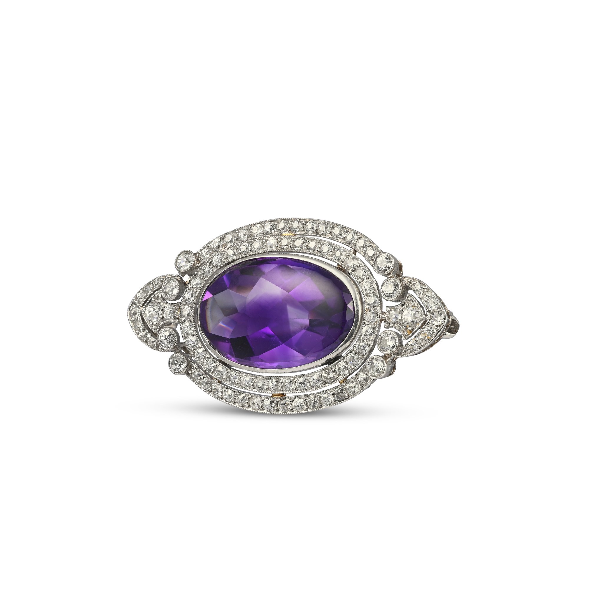 A8952 B AN AMETHYST AND DIAMOND BROOCH.jpg