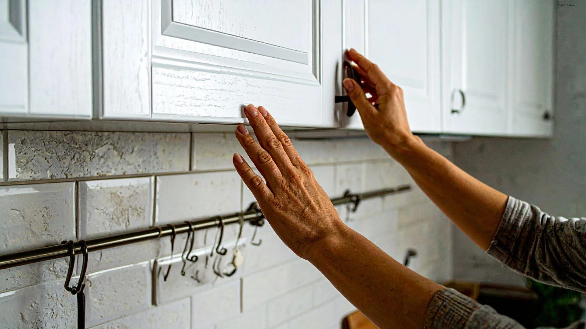 opening a kitchen cabinet