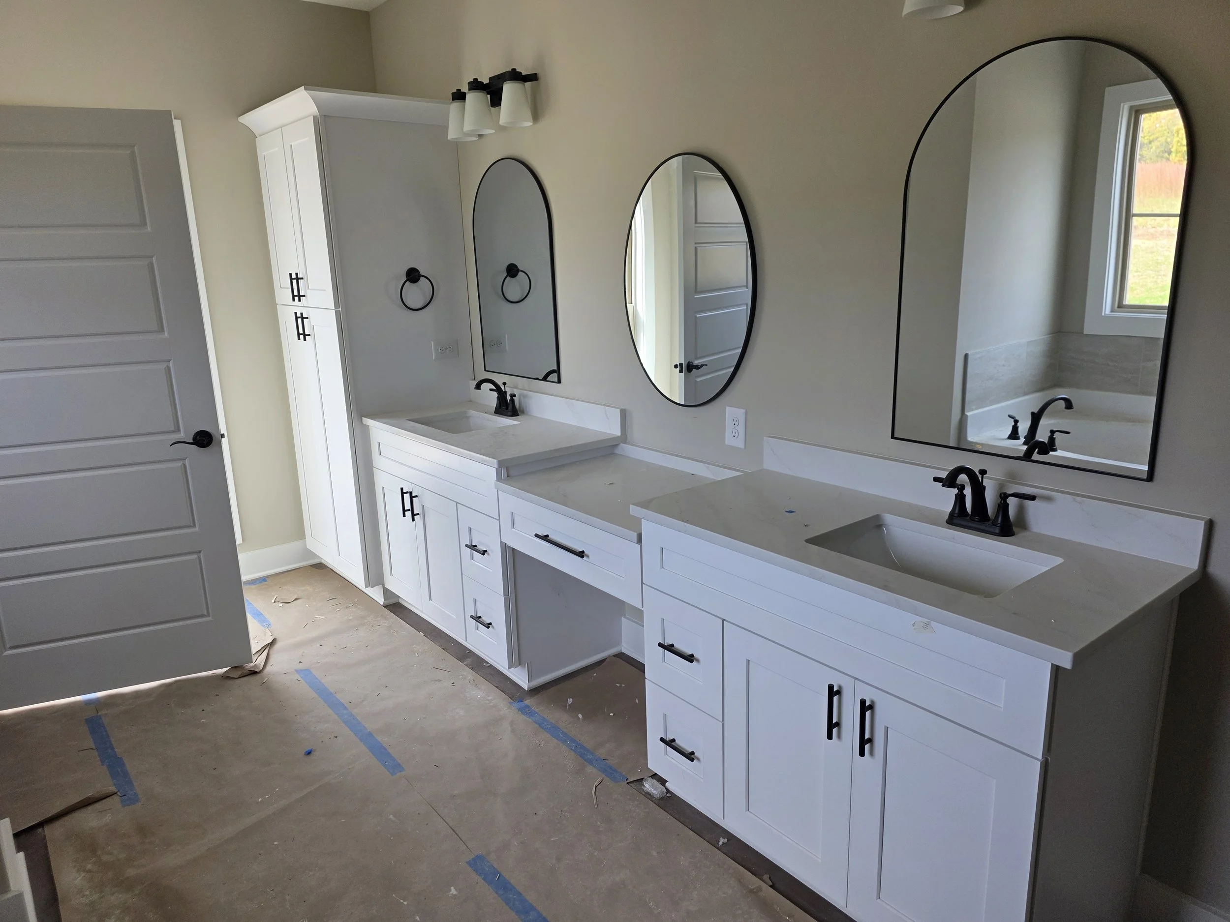 White Shaker Cabinets with Powder Table