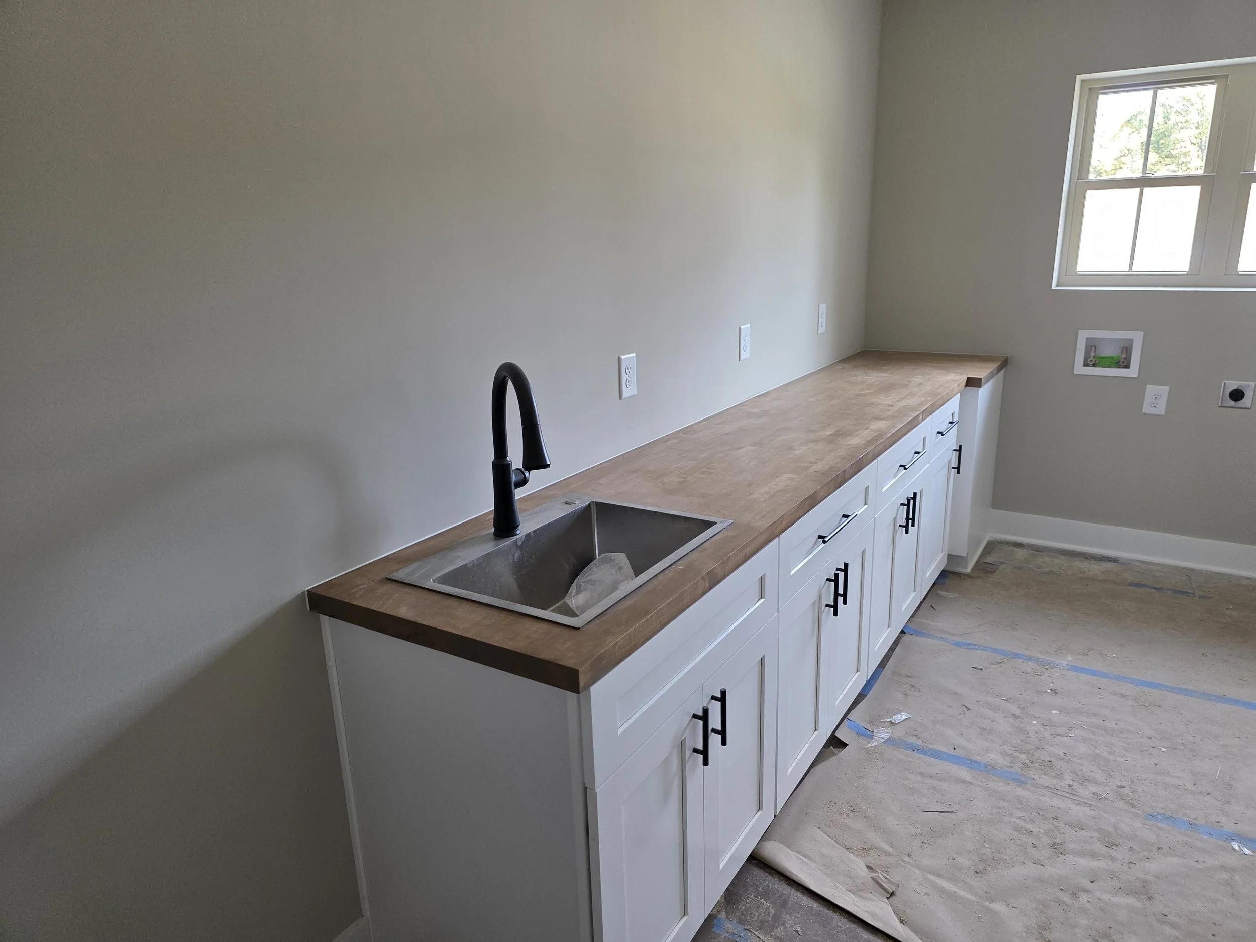 White Shaker (Cabinets)/Butcher Block (Countertop)