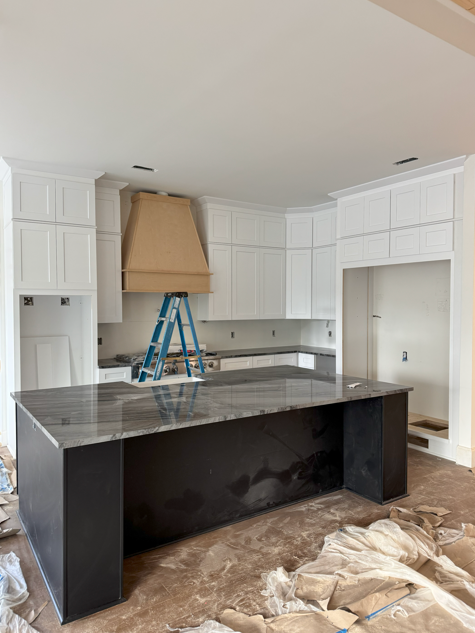 White Shaker Cabinets Double Stacked/ Black Shaker Island/ Silver River Quartz