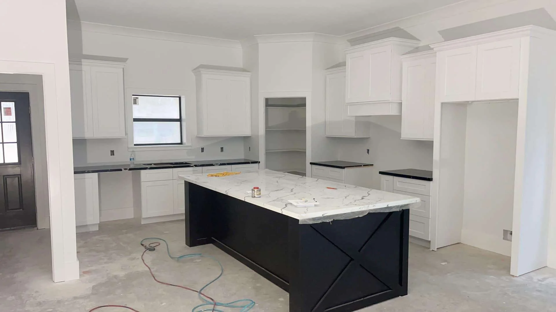 White Shaker Cabinets/ Black Shaker Island
