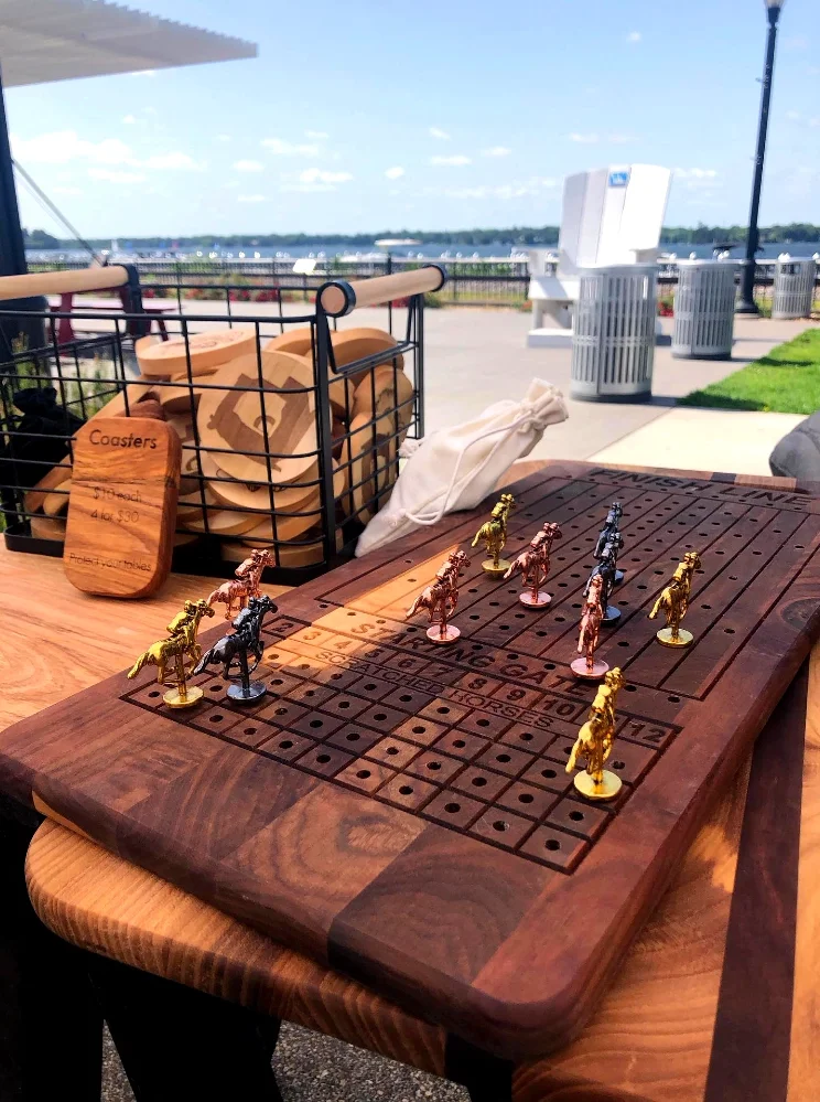 horse racing wooden board on picnic table