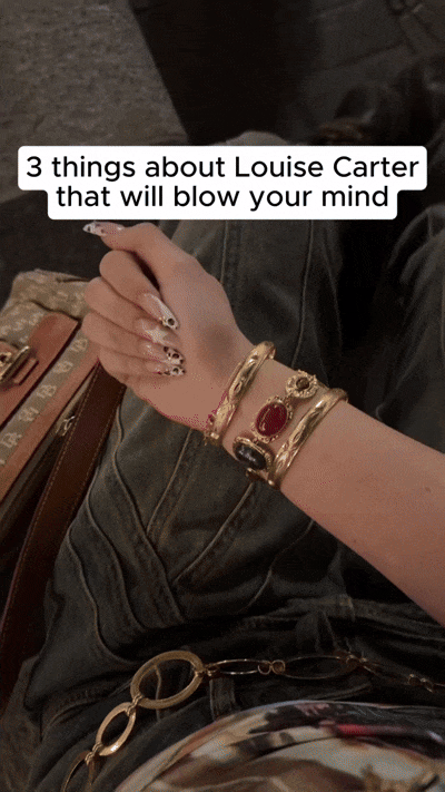 Close-up of a woman's wrist adorned with gold jewelry, including a bracelet and rings, with a caption overlay reading '3 things about Louise Carter that will blow your mind', while her hands rest on her lap.