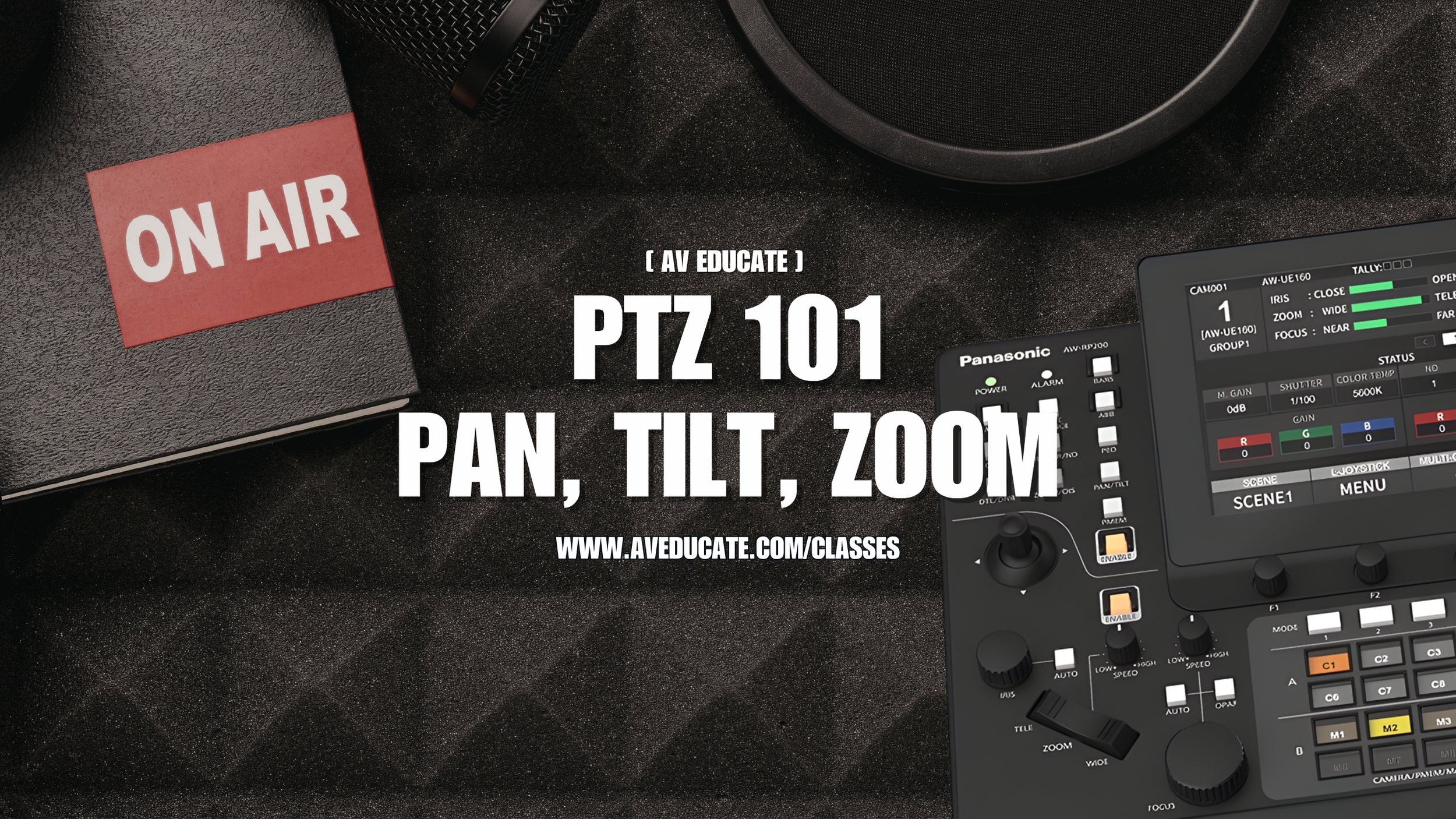 A black notebook with a red "ON AIR" sign, a microphone, a PTZ camera logo with details, and a black control panel with various buttons and knobs on a dark surface.