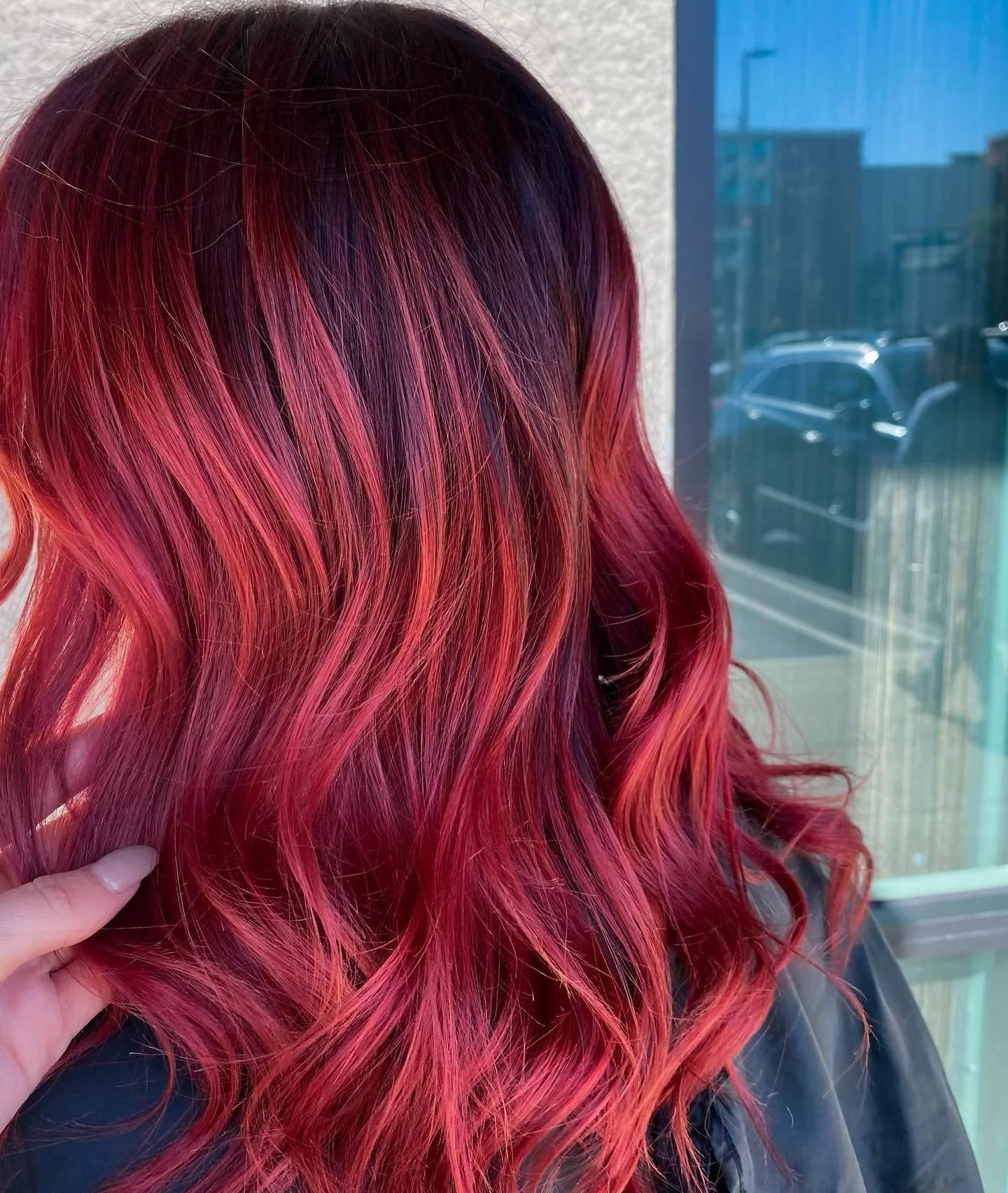 Deep reds with all the dimension 🌹
.
Color/Style By- @beautybydenzz 
.
#balayage #red #redhead #redhair #ochair #ochsirstylist #balayageombre #style #reds