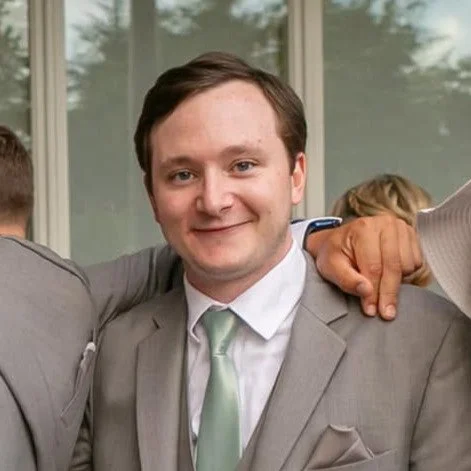 Photo of Ian Maries-Bierley in a grey suit