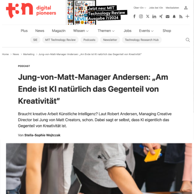 Artikelüberschrift auf der Webseite von t3n über das Thema Künstliche Intelligenz und Kreativität, mit einem Bild von Menschen beim Arbeiten im Büro.