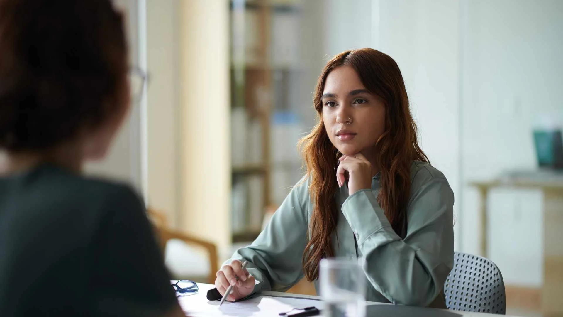 woman receiving feedback at work
