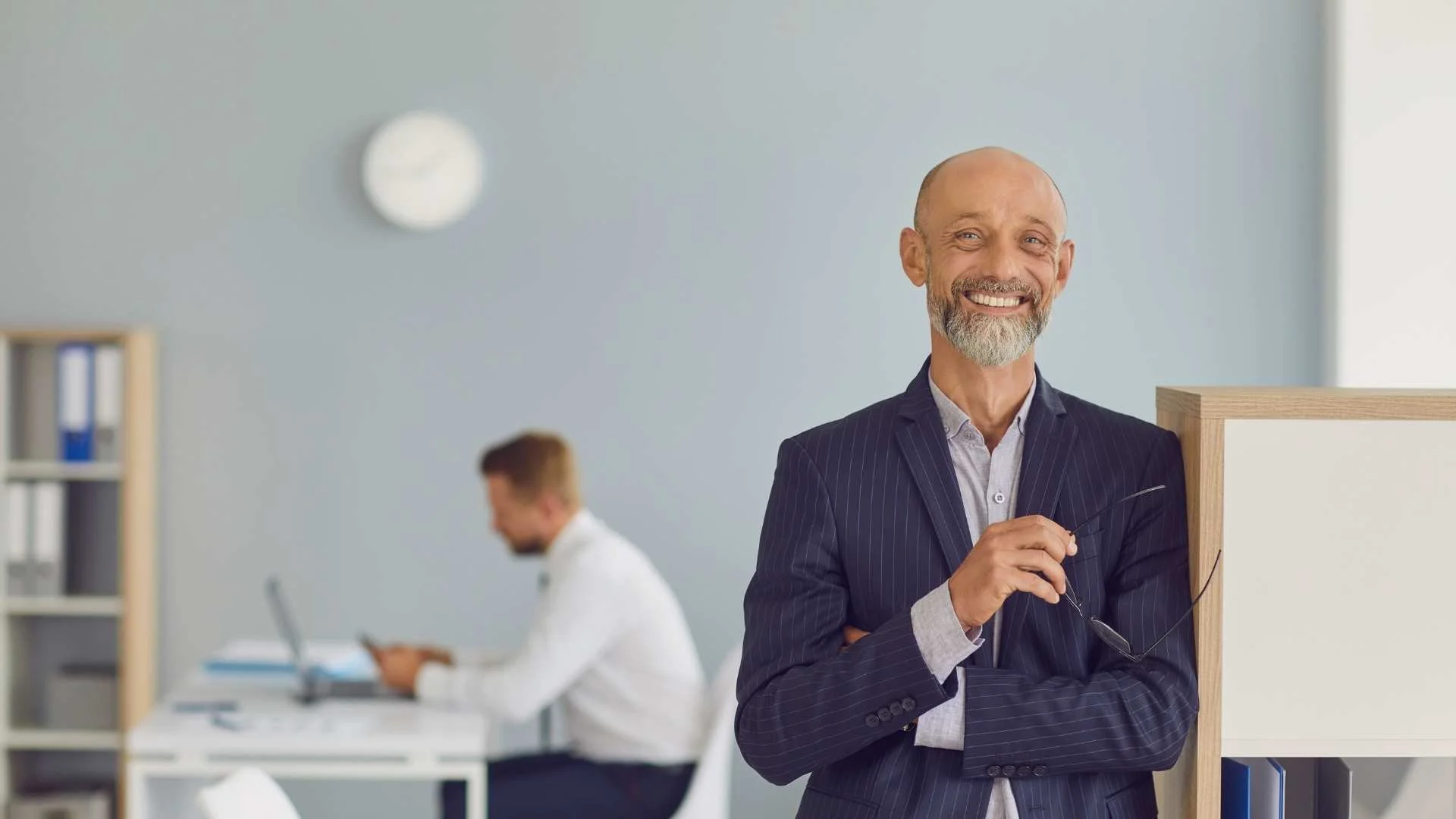 man smiling in executive coaching session