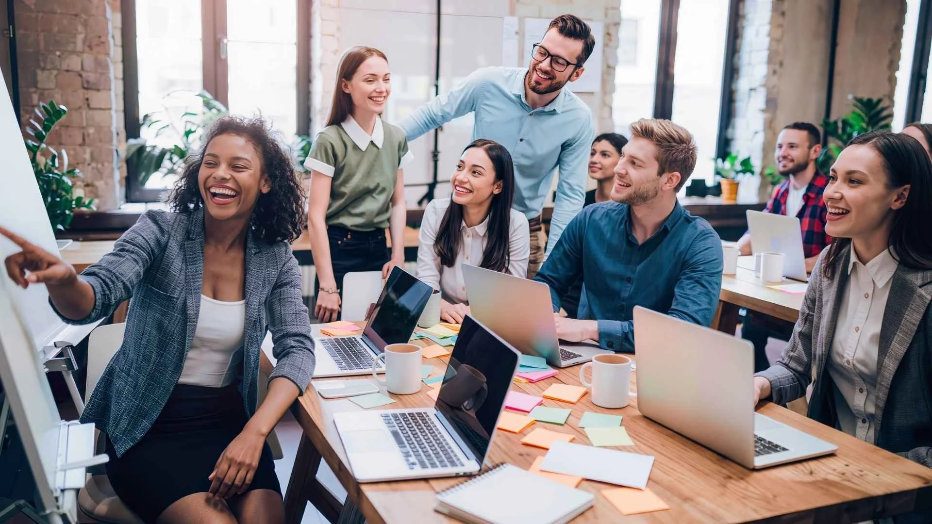 corporate team collaborates at work