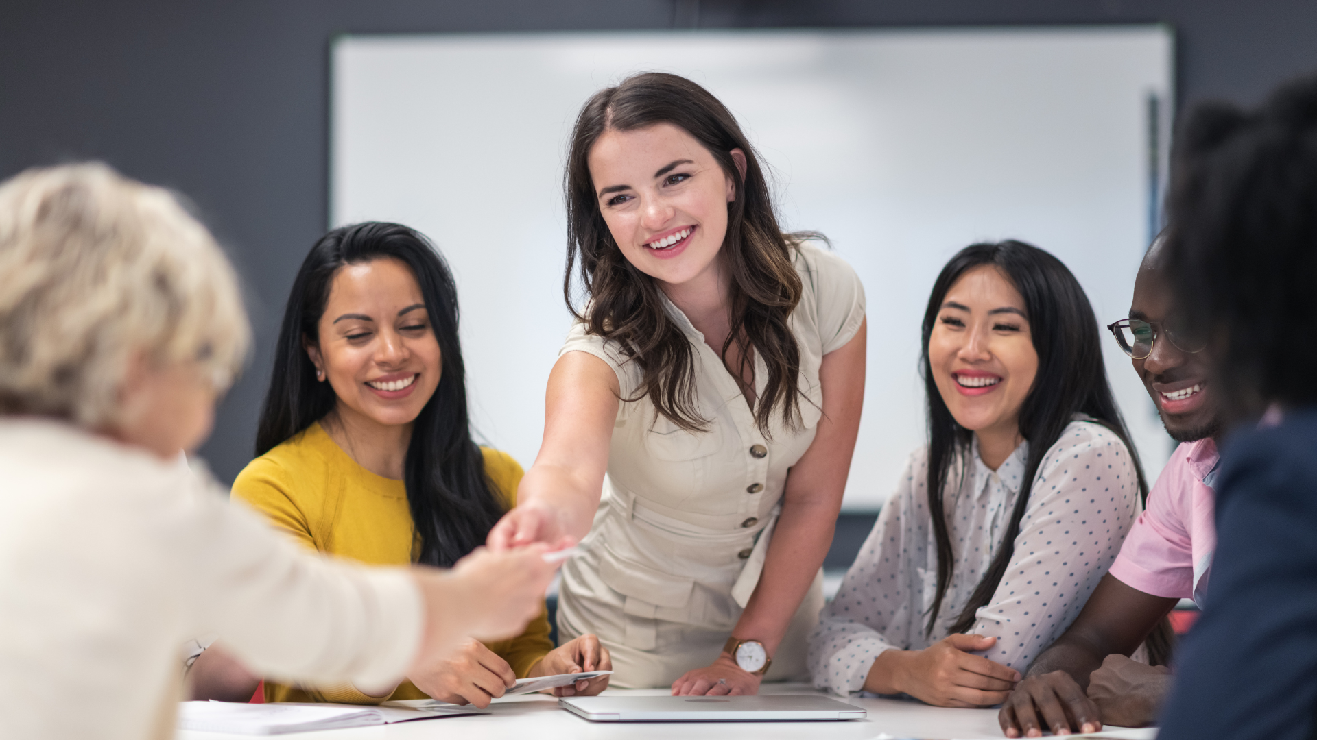 women leaders shaking hands