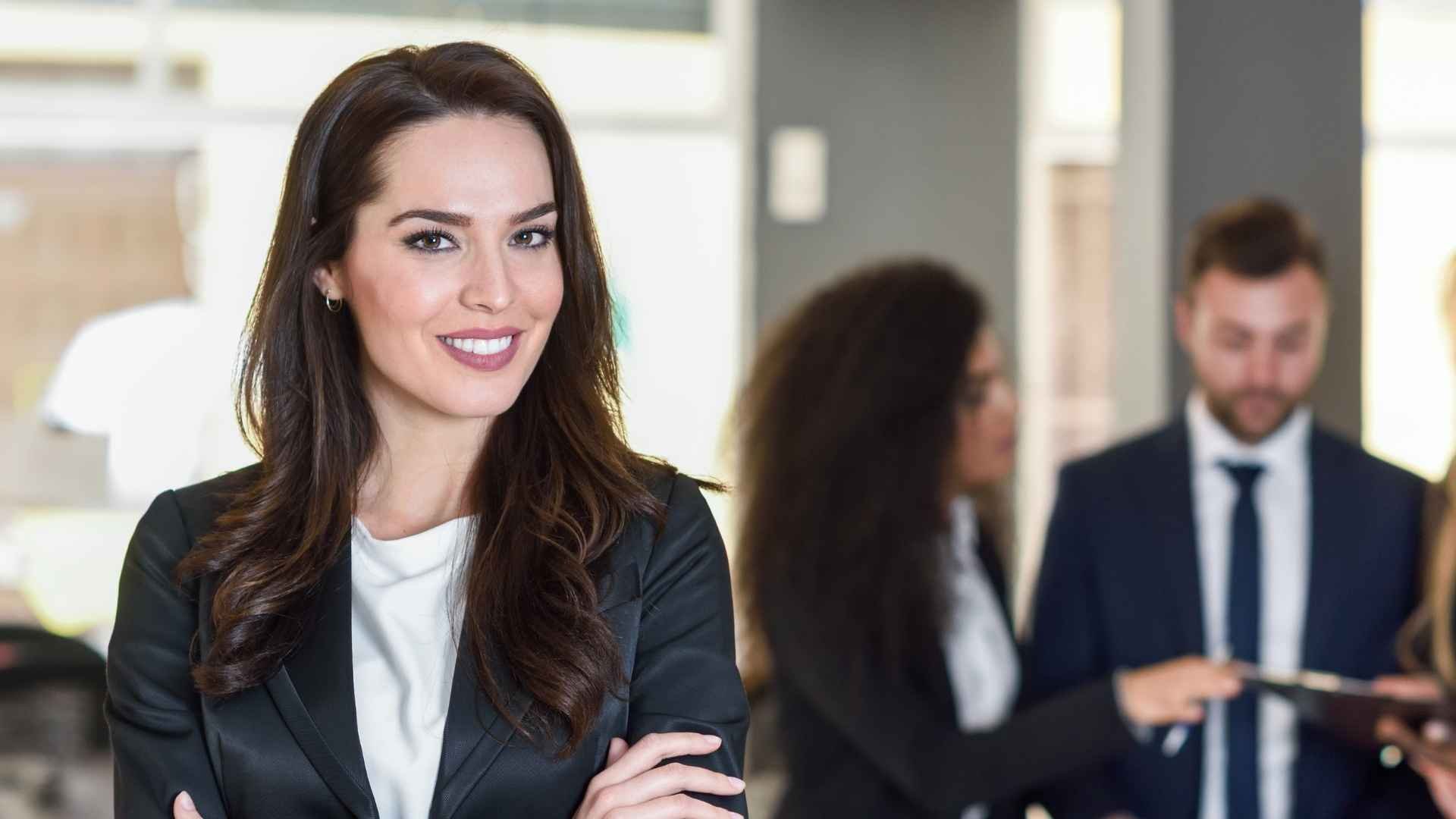 executive woman with team at work