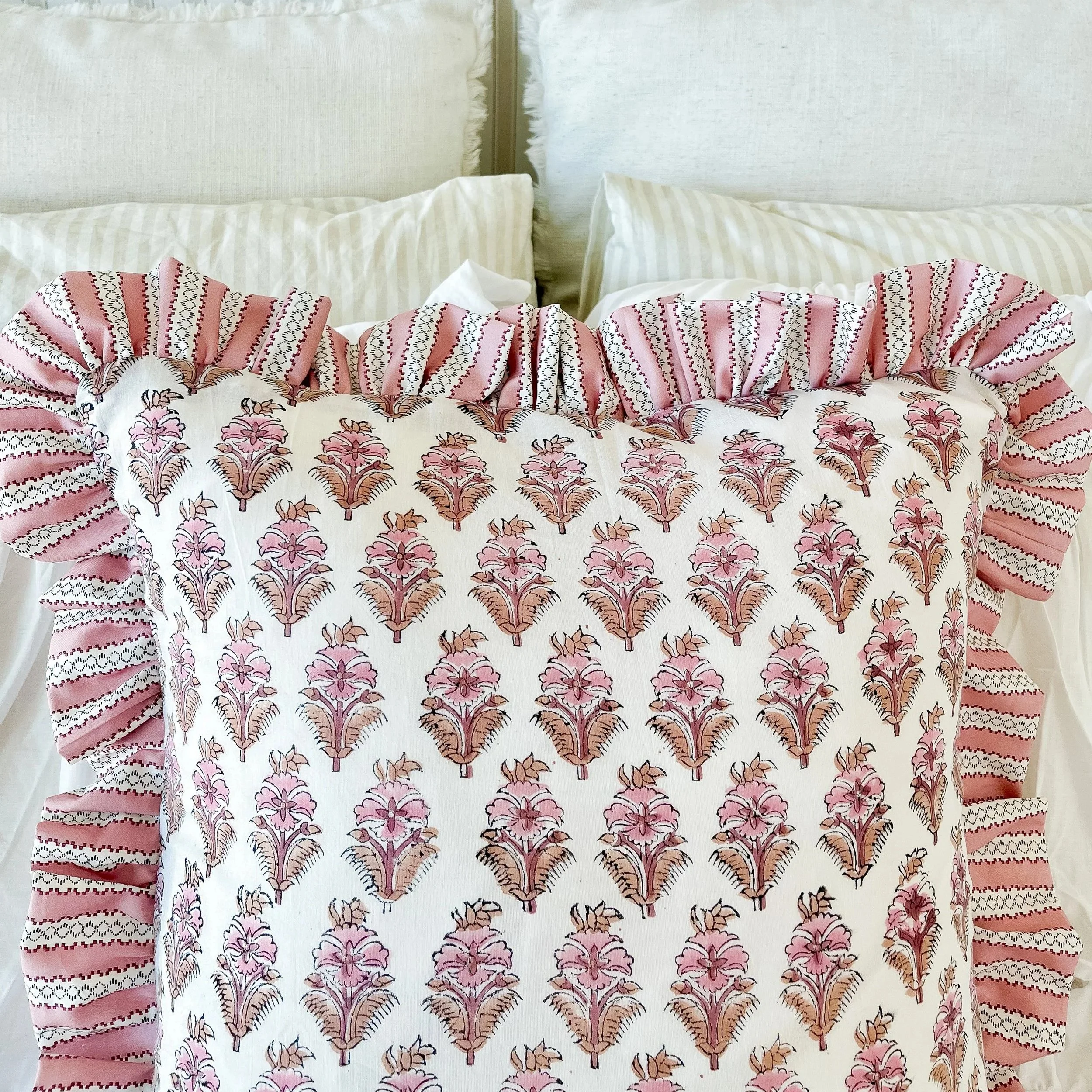 Pillow with farm animal print and green gingham ruffled edge