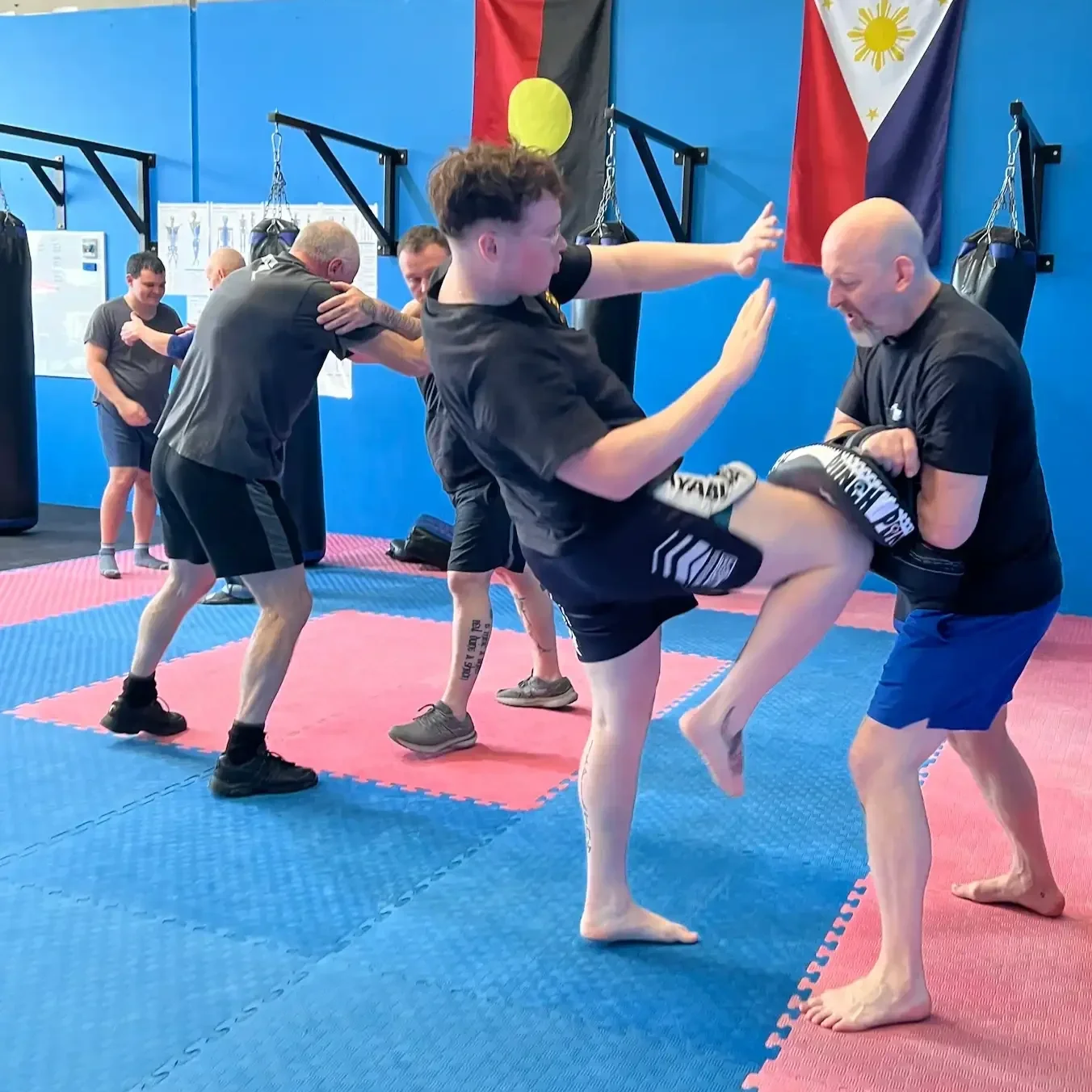 Men training at a workshop at Raw Life Australia, Rowville