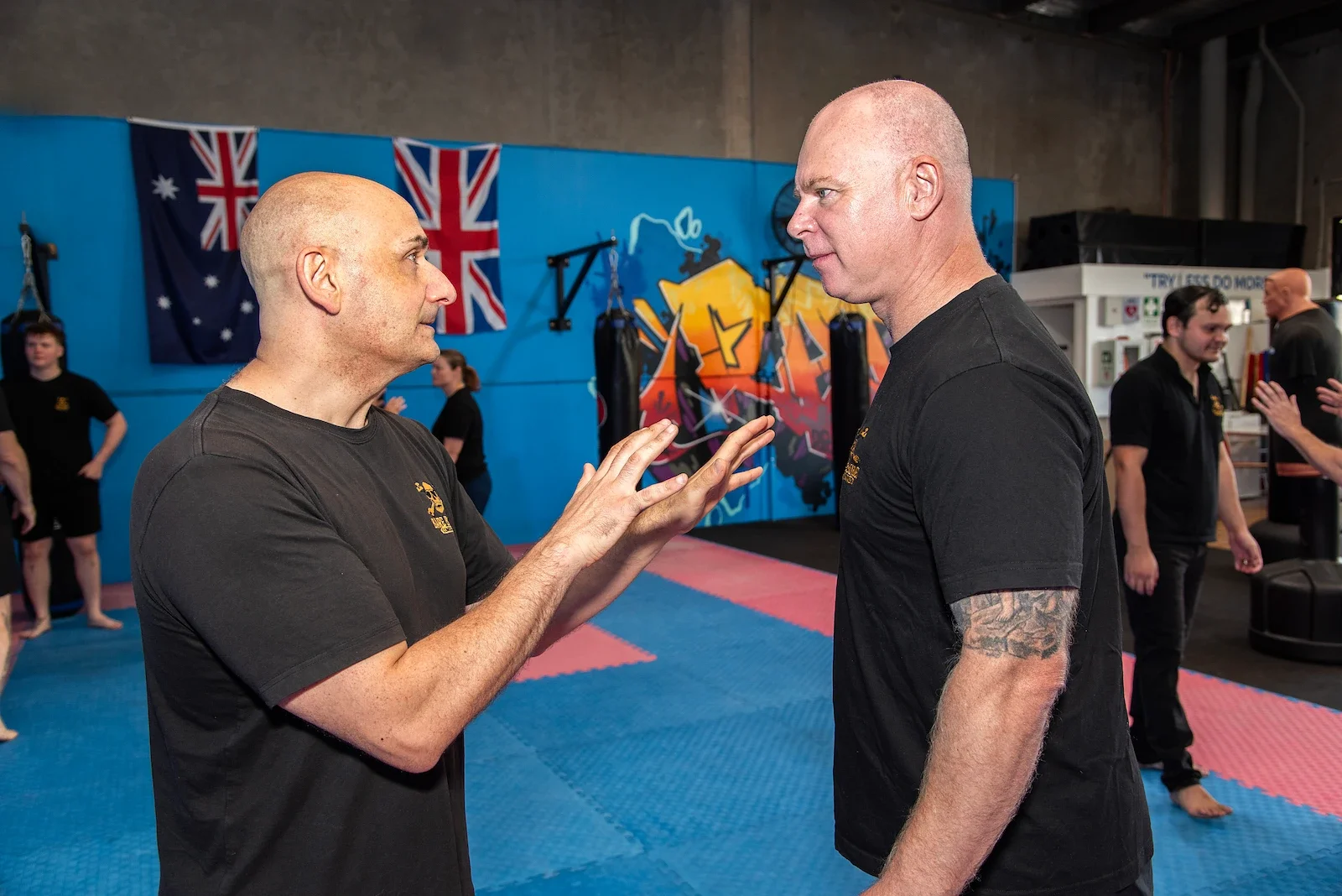 Two men training in Raw Combatives