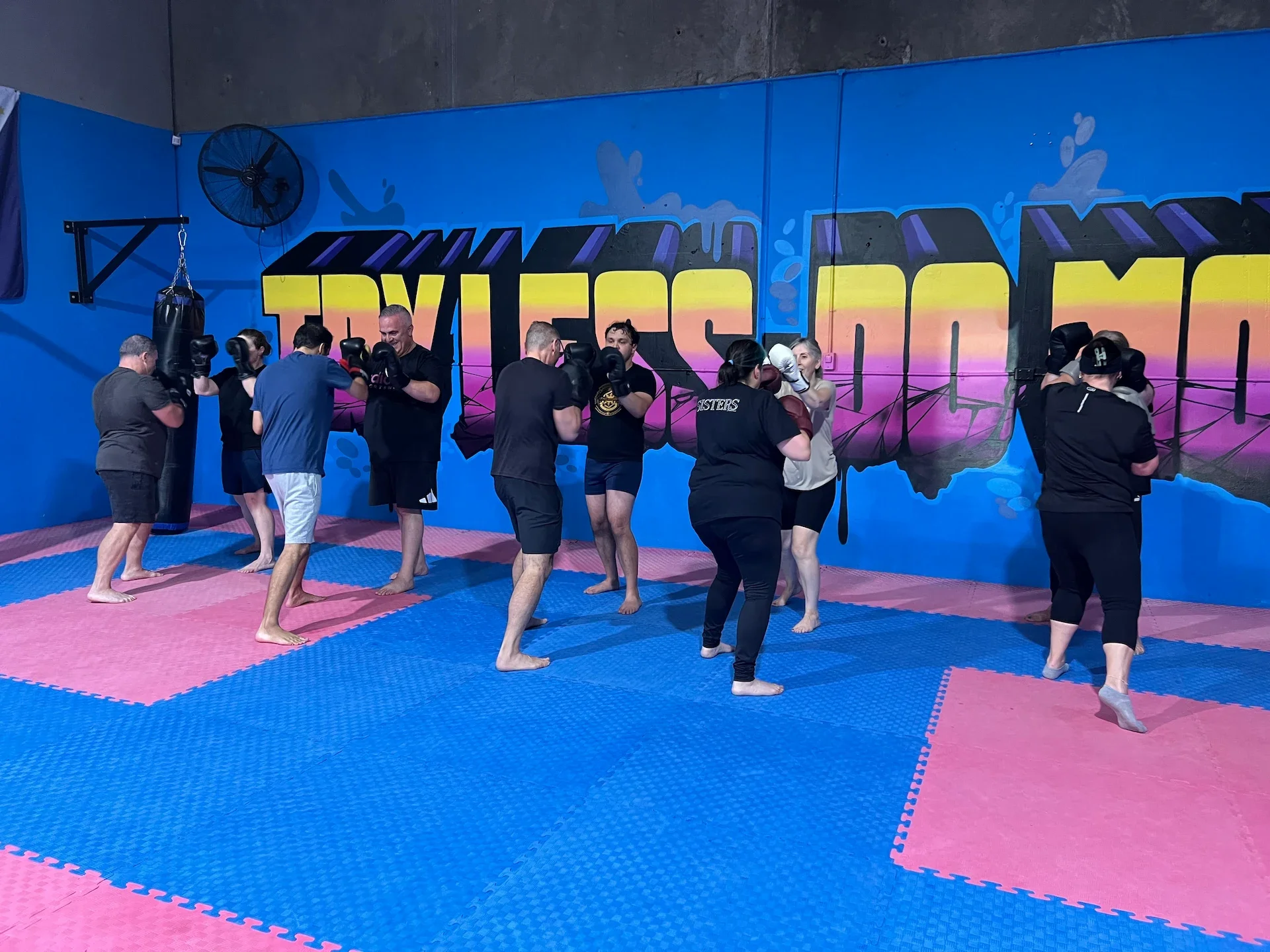Guys enjoying a Kickboxing Fitness class a Raw Life Australia