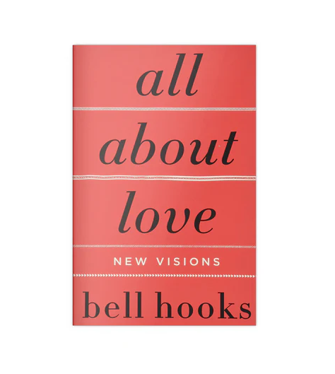 Image of bell hooks' book All About Love: New Visions. The book has a red cover with black and white text.