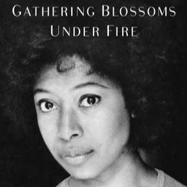 Black and white image of a person with curly hair, below text saying 'Gathering Blossoms Under Fire'.