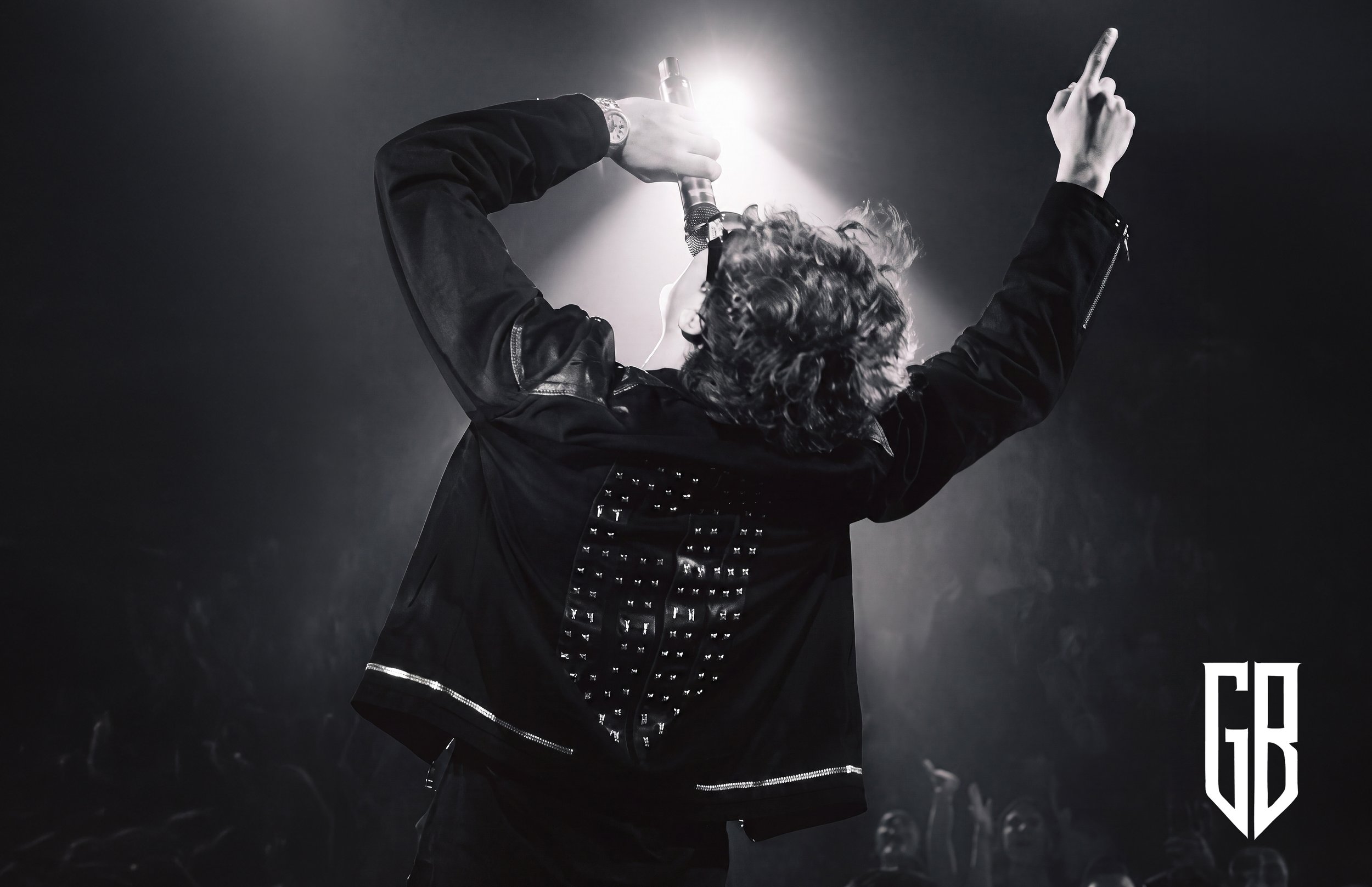 Gabito Ballesteros on stage in a studded jacket