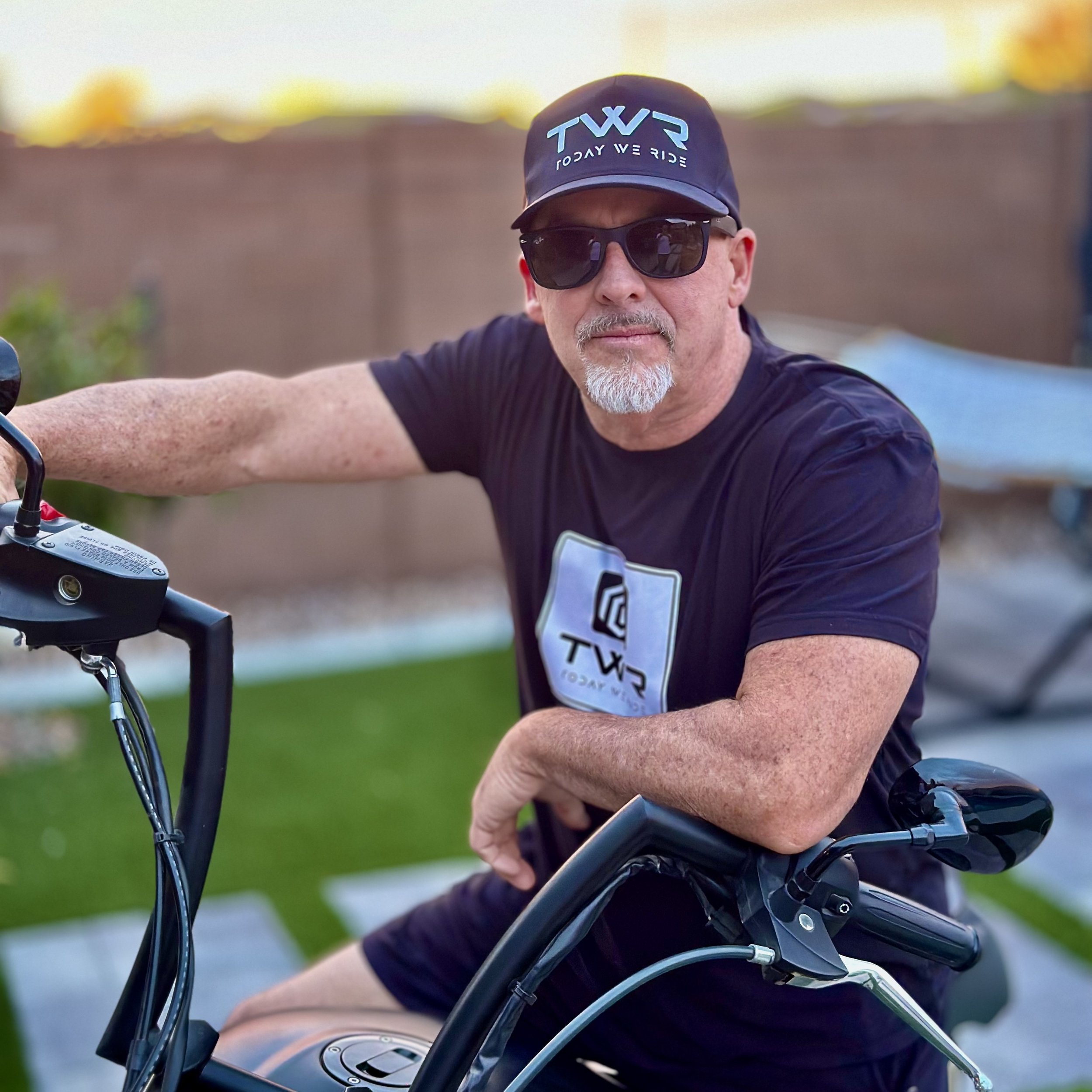 TWR Today We Ride Black Flexfit Delta Hat Mike on Bike.jpeg