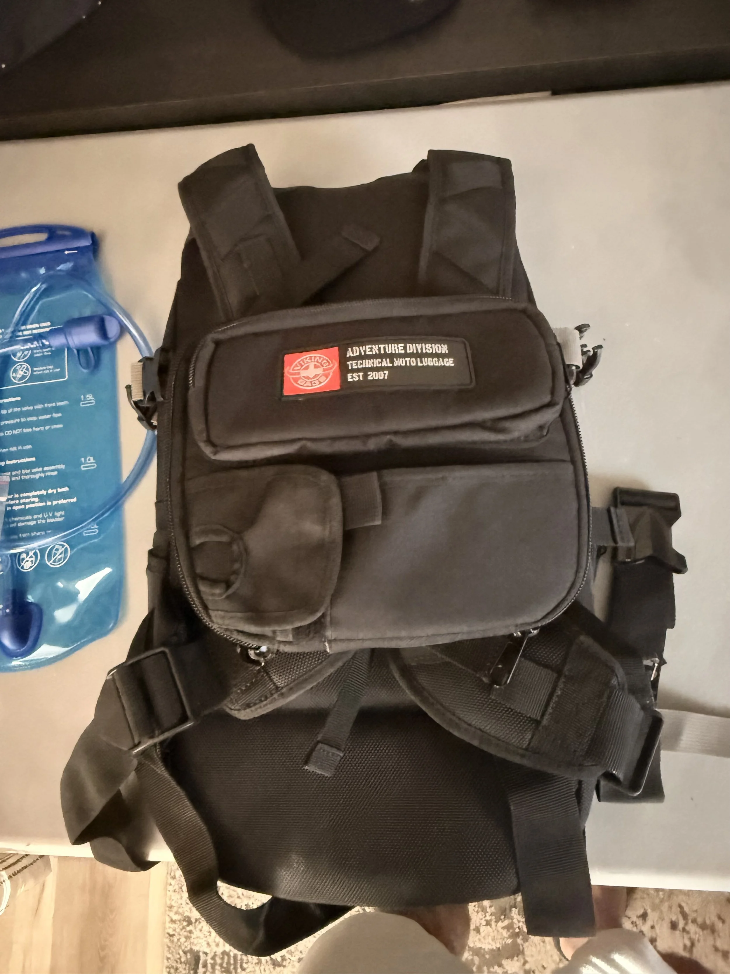Backpack with chest harness