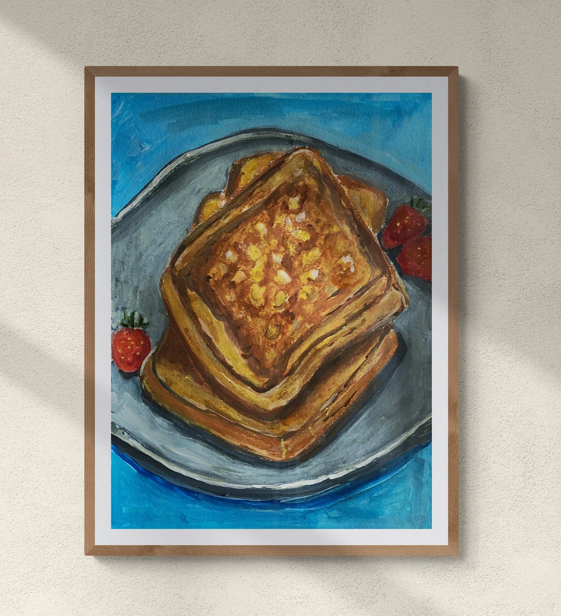 French toast on grey plate on blue background framed hung on wall.jpg