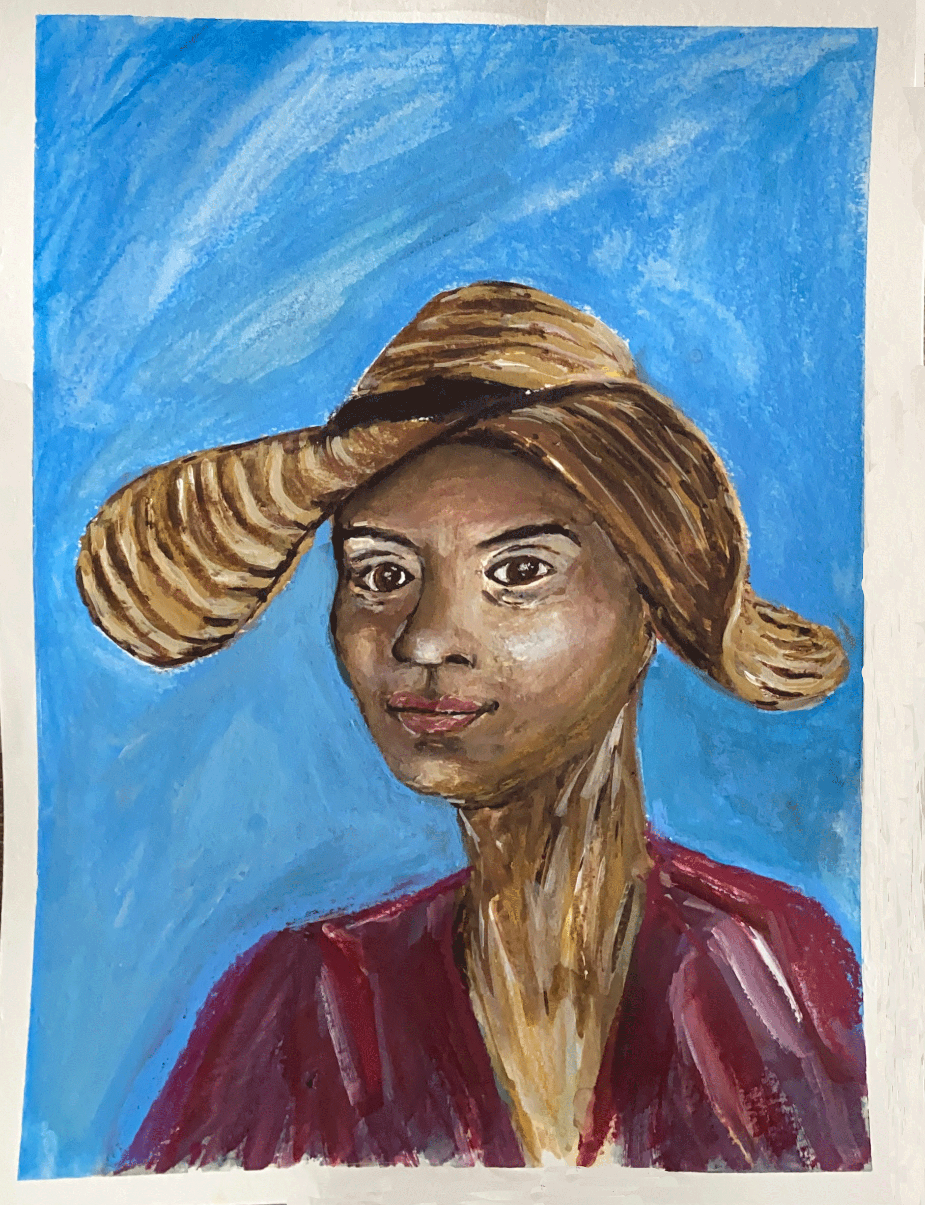woman in big sun hat and red top on blue background.png