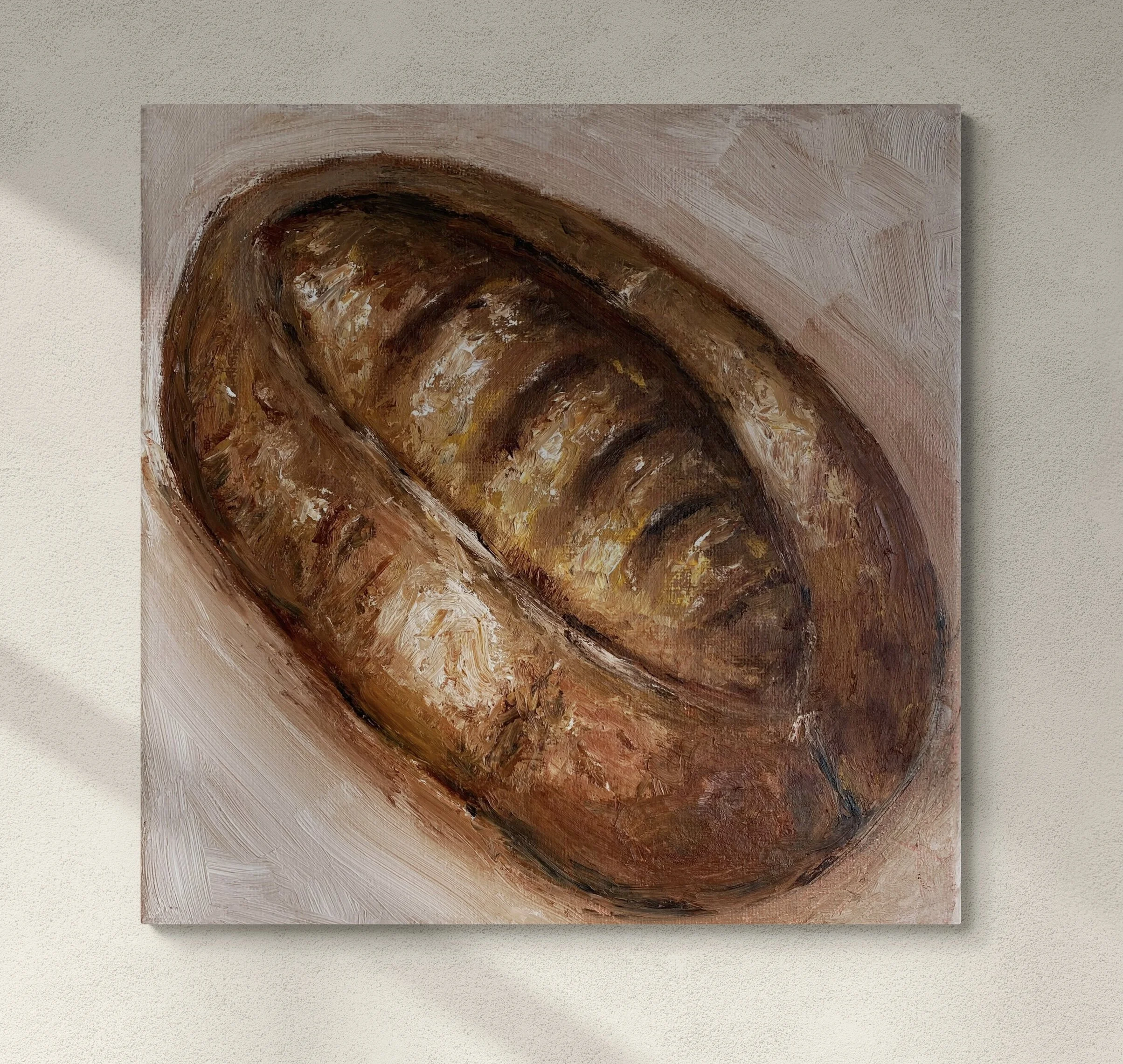 brown sourdough bread painting hung on wall