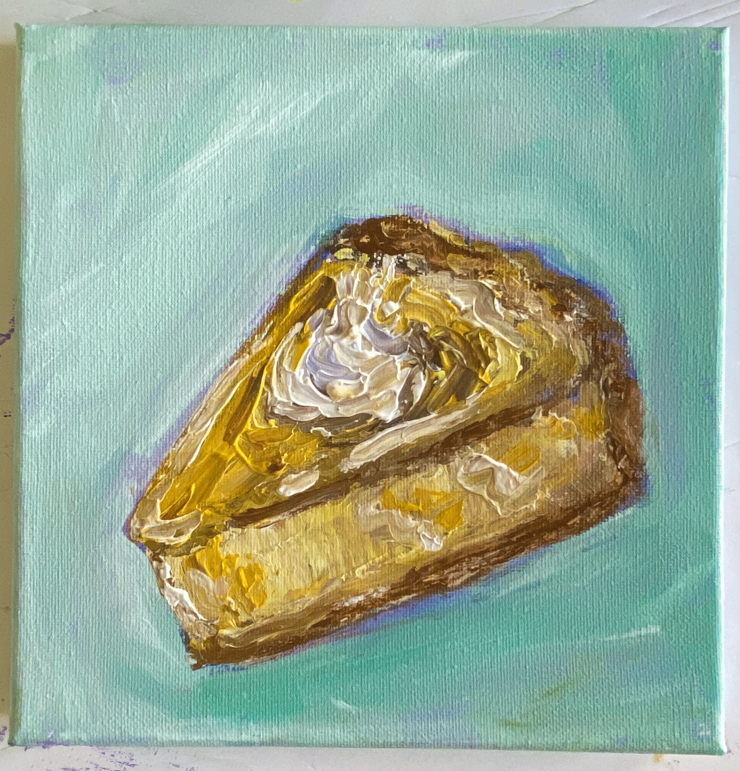 lemon cheesecake painting on mint background.png