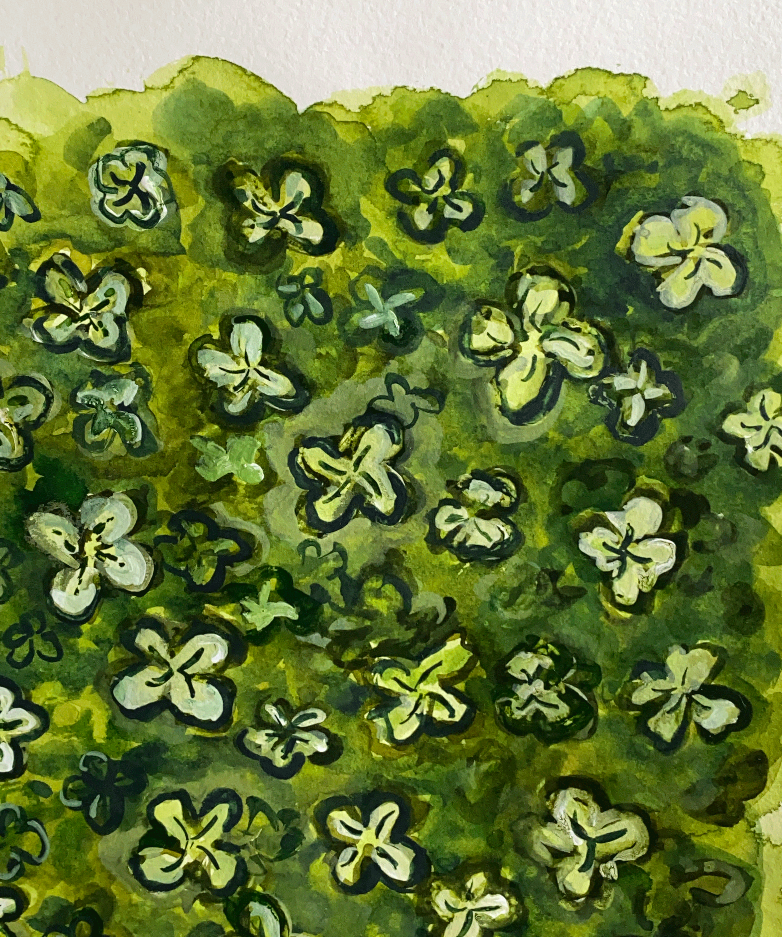 repeat pattern of 4 leaf clovers close up.png