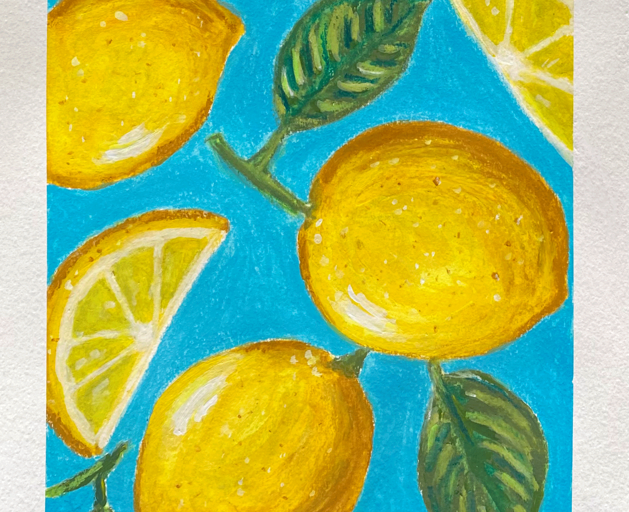 bright yellow lemons on blue background close up.png