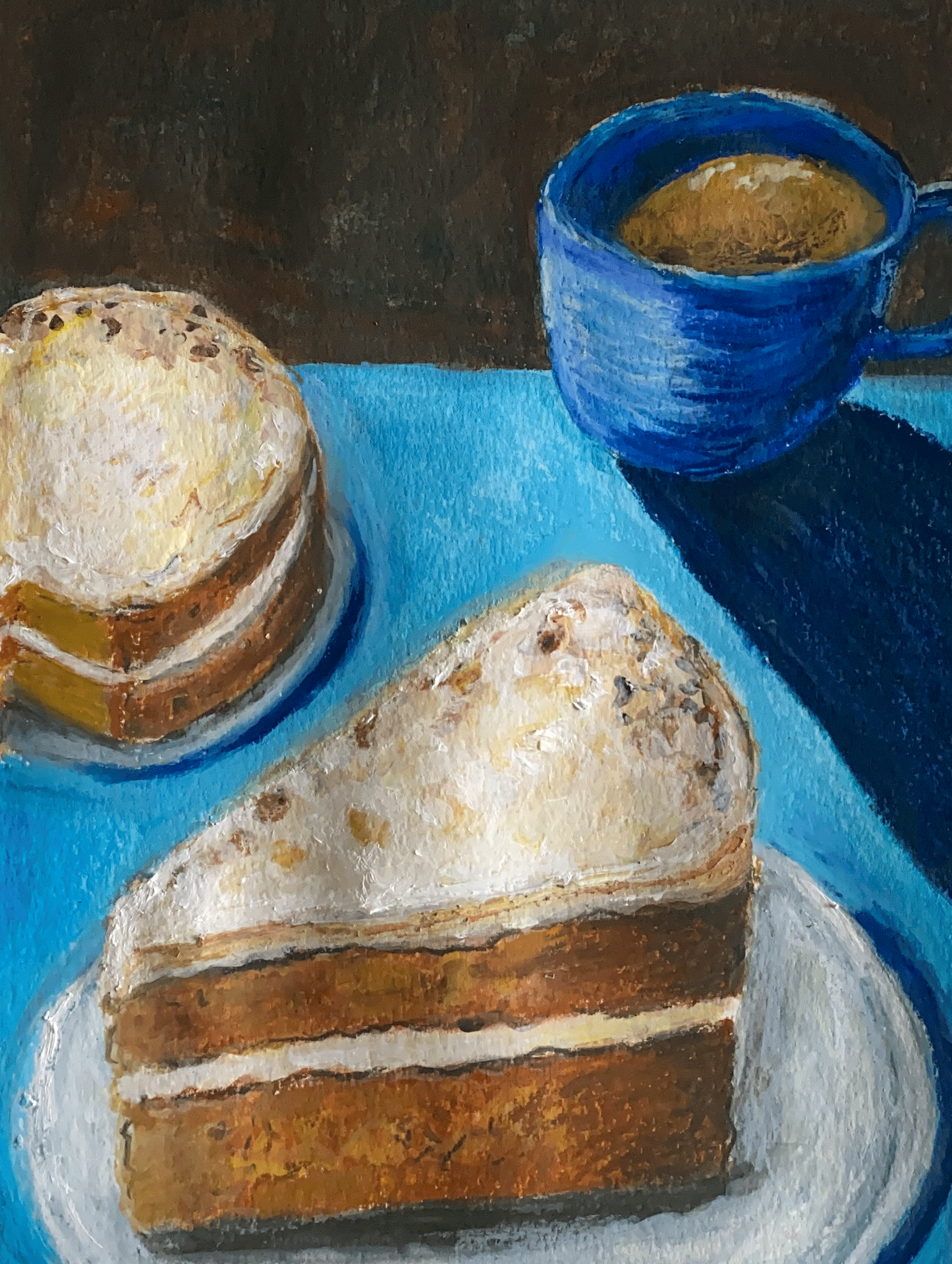 carrot cake with coffee on blue table and brown background close up.png