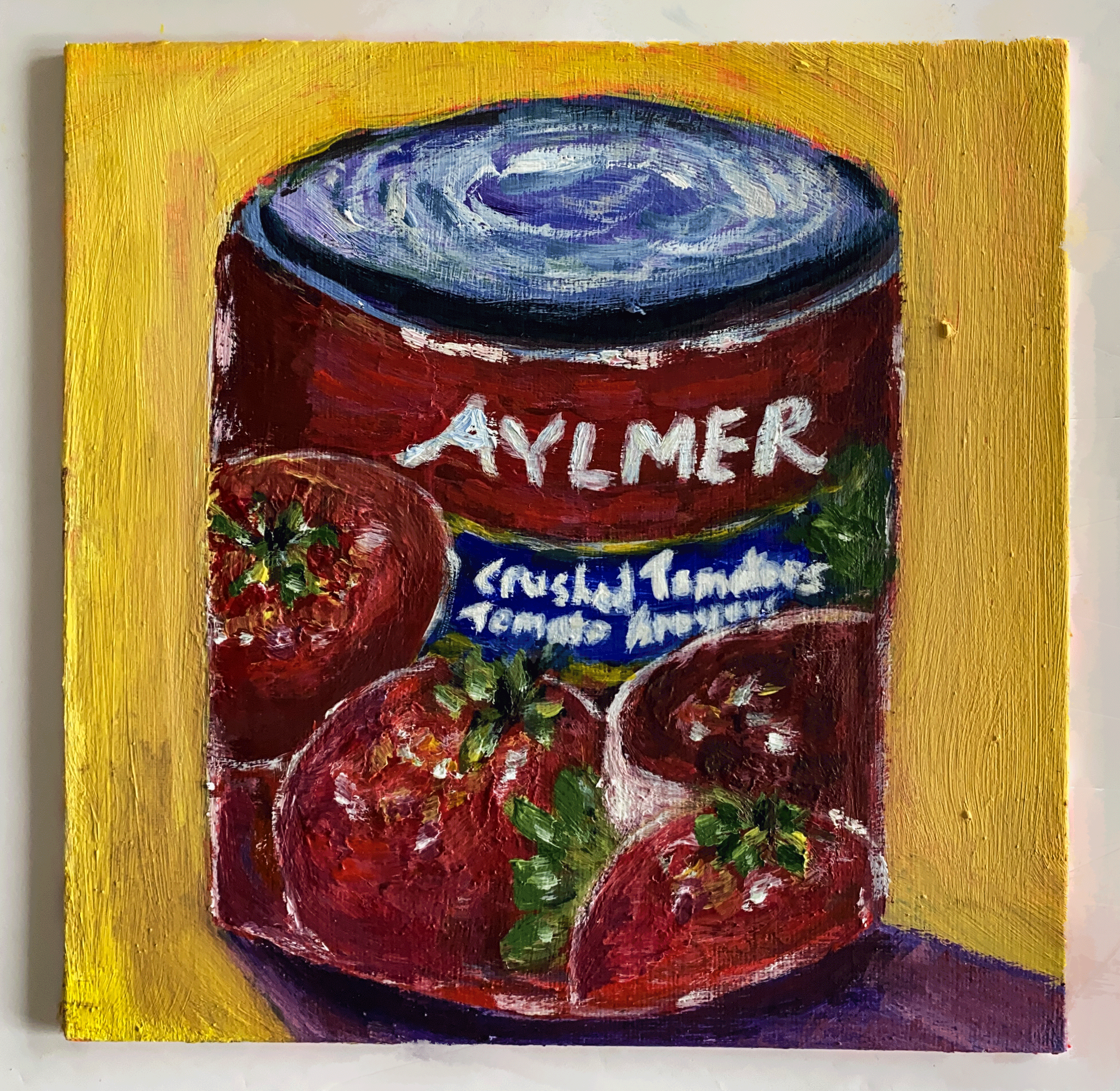 half opened red can of crushed tomatoes with white lettering on yellow background.png