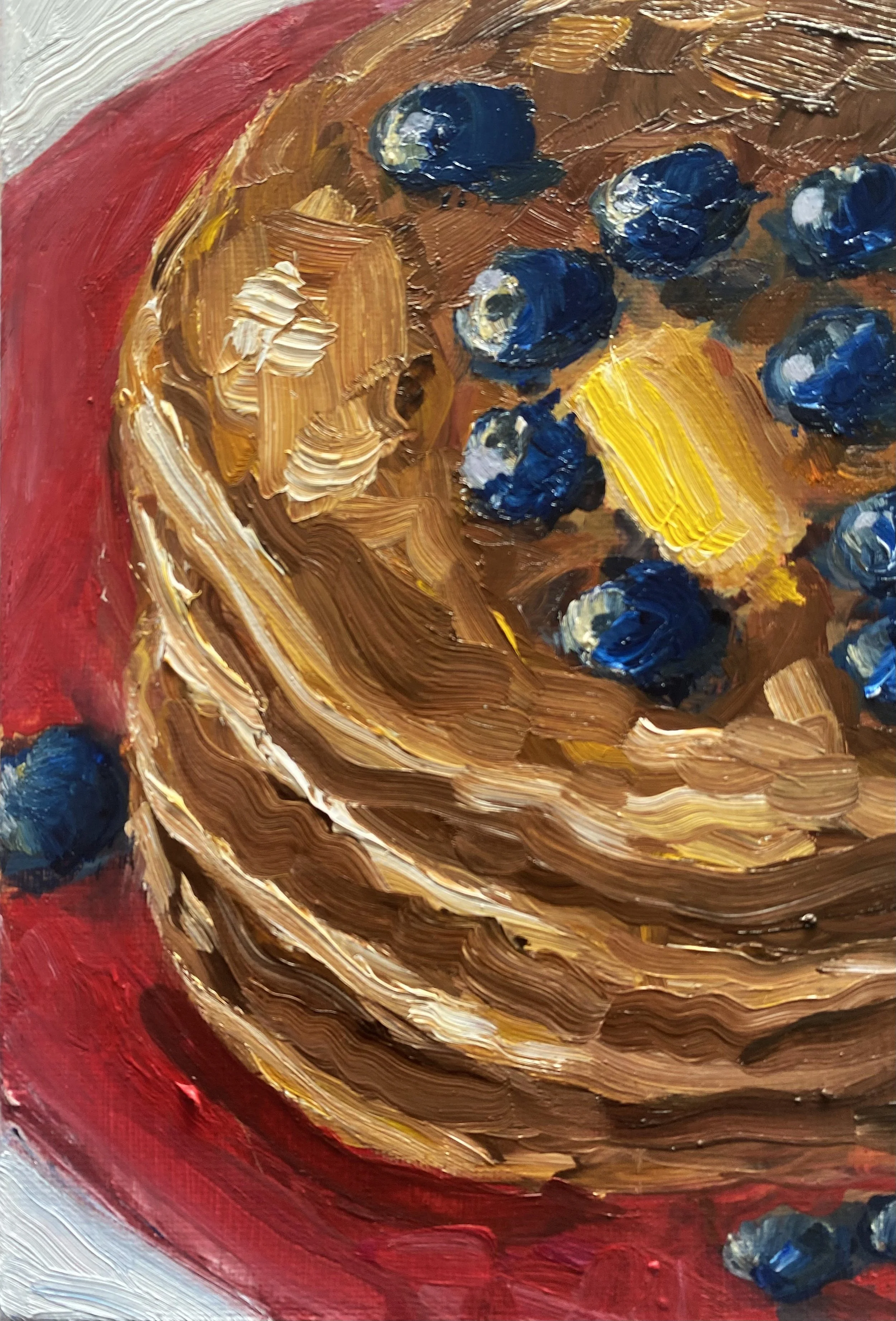 Close up of painting of pancakes with blueberries