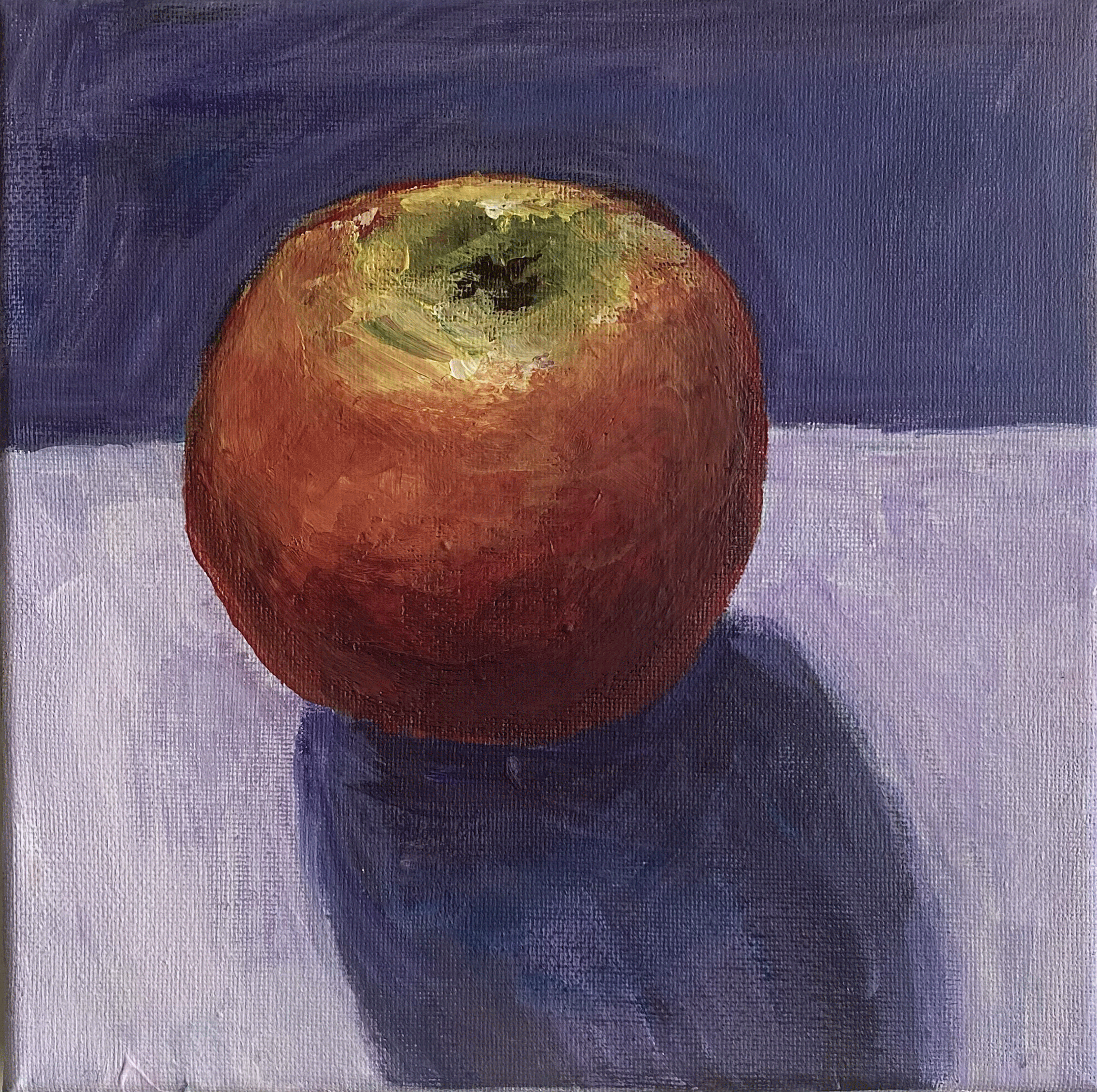 apple on purple background with shadow.png