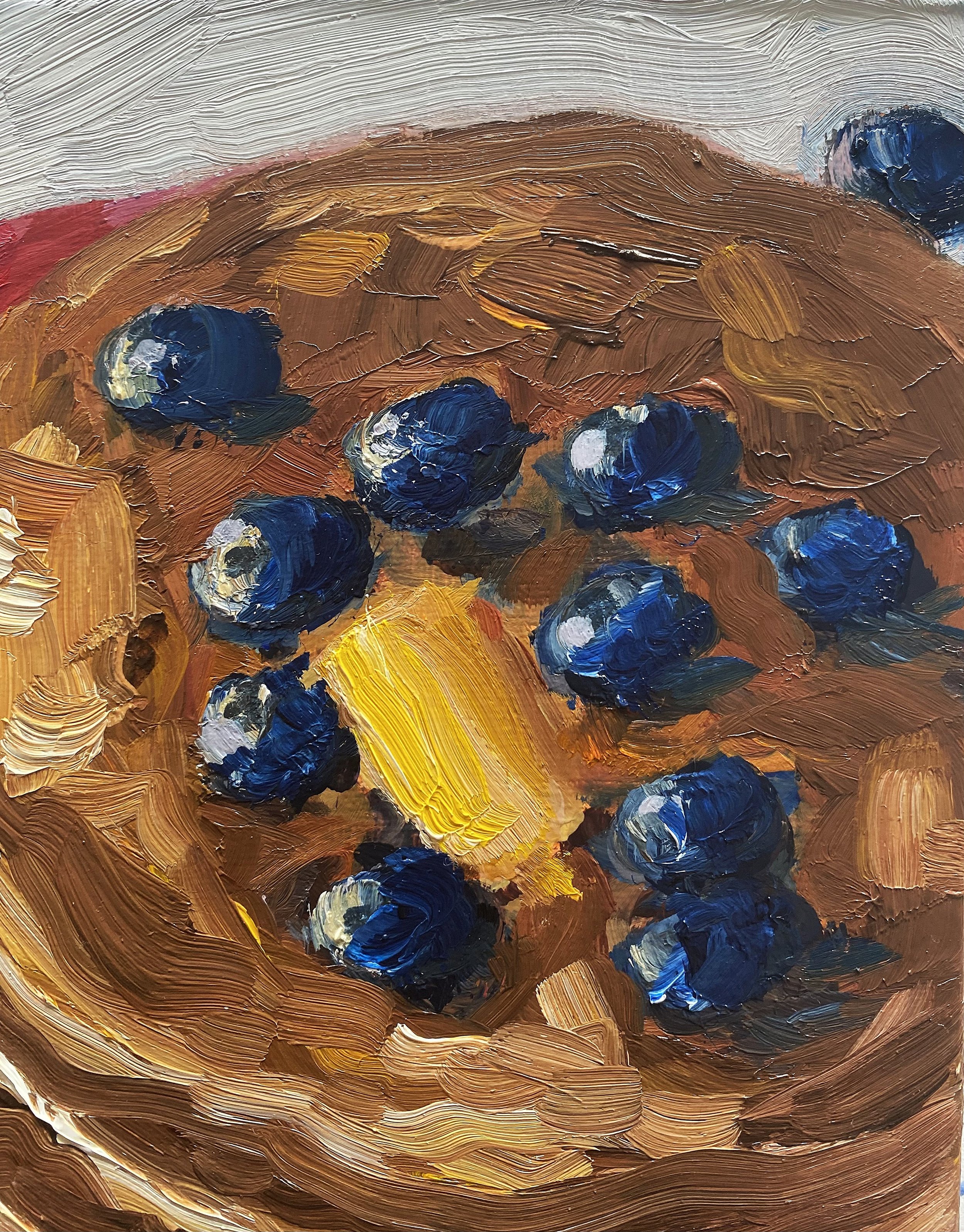 painting of pancakes with butter and blueberries on red plate